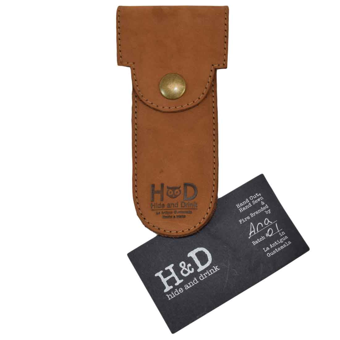 Hide & Drink Barber Razor Sheath displayed in light brown leather, featuring a contemporary design as a Double Edge Protector Case. This essential Safety Cover serves as a portable carry bag for the discerning traveler.