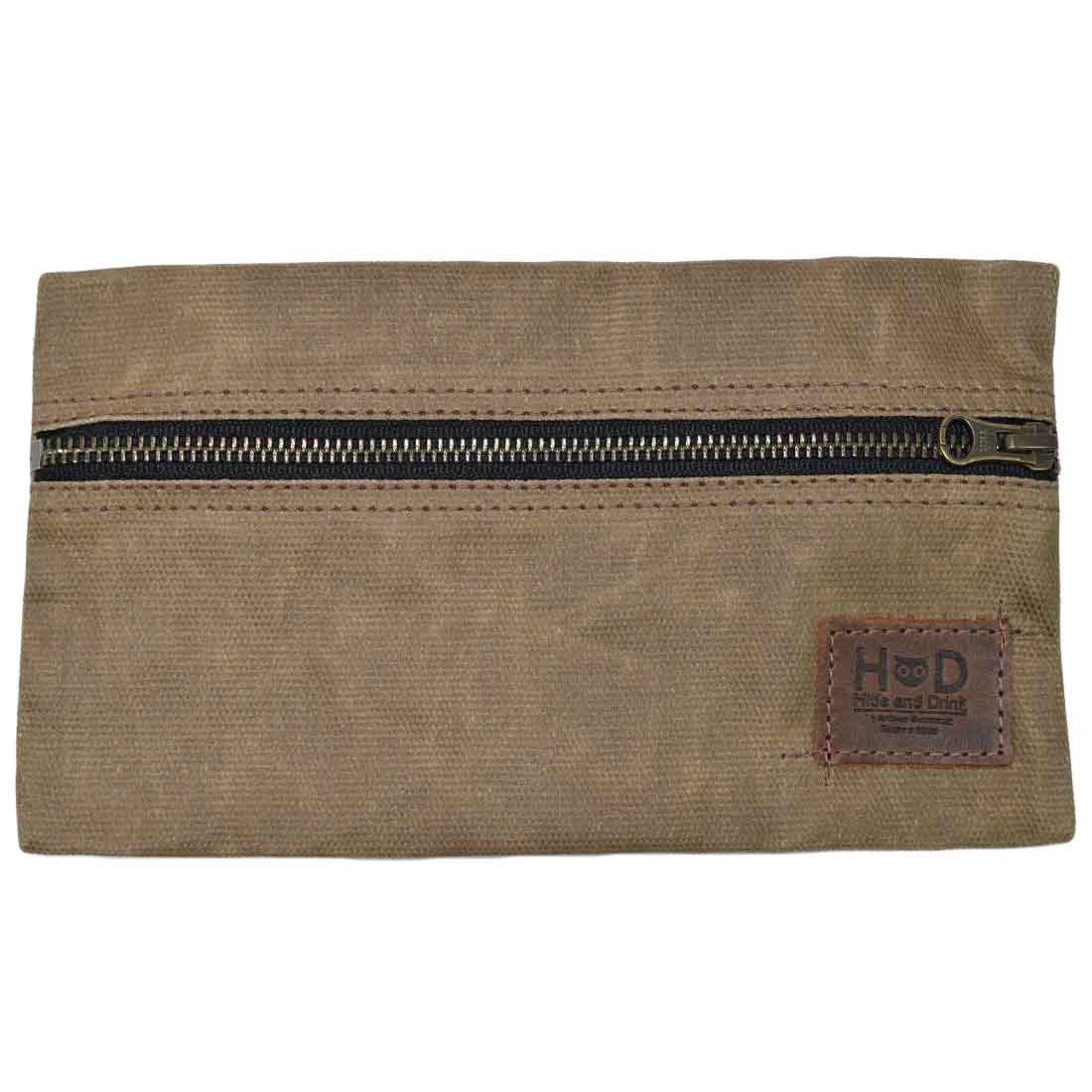 Hide & Drink Utility Cord Pouch presented with a focus on its artistry and functionality. A versatile all-purpose utility & charger case for MacBook, iPad & Laptop, it effectively serves as a cable organizer, handcrafted in La Antigua Guatemala & Oaxaca Mexico.