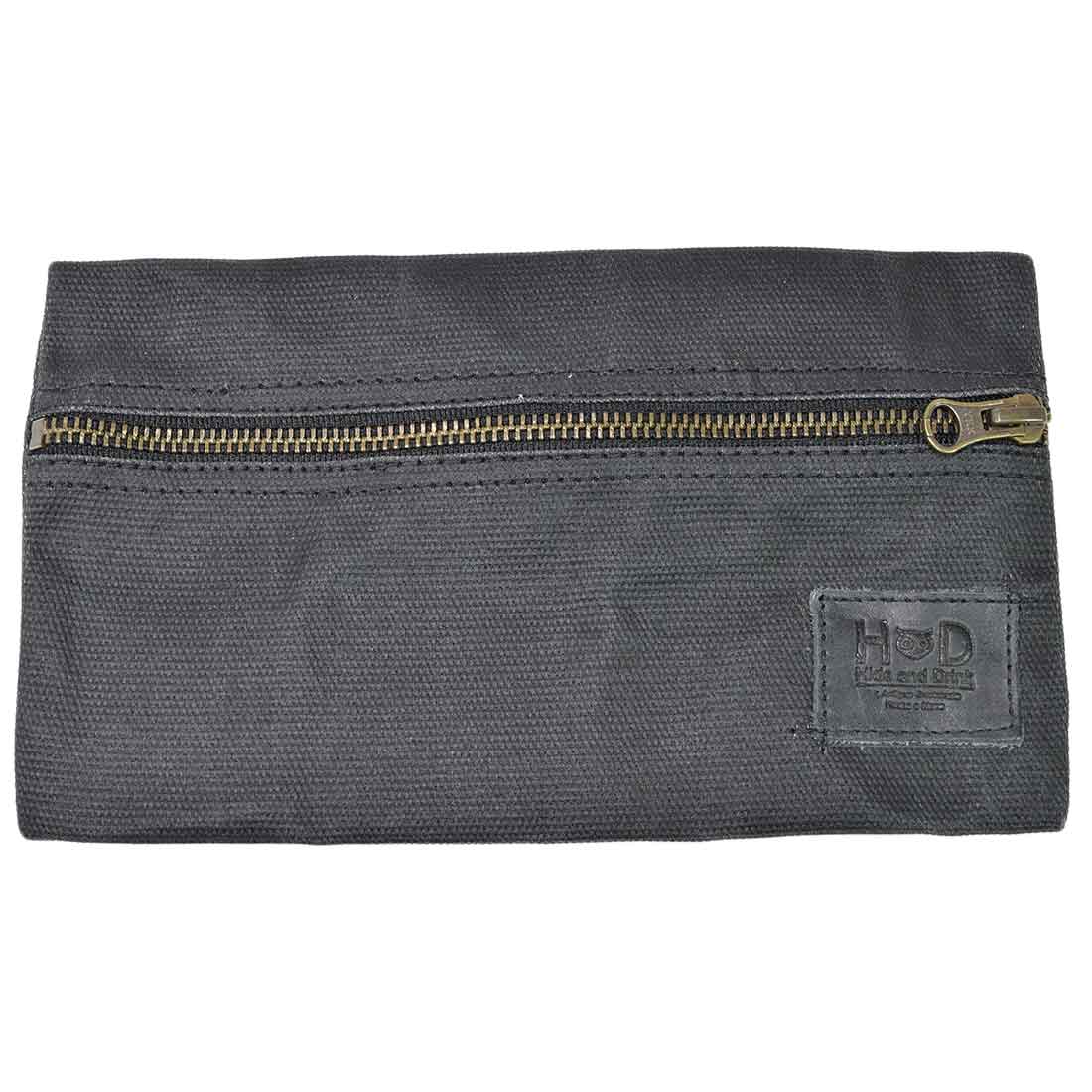 Hide & Drink Utility Cord Pouch captured in a dynamic view, showcasing its attractive design. An ideal all-purpose utility & charger case for MacBook, iPad & Laptop, it effectively facilitates organization as a cable organizer, artisan-made in La Antigua Guatemala & Oaxaca Mexico.