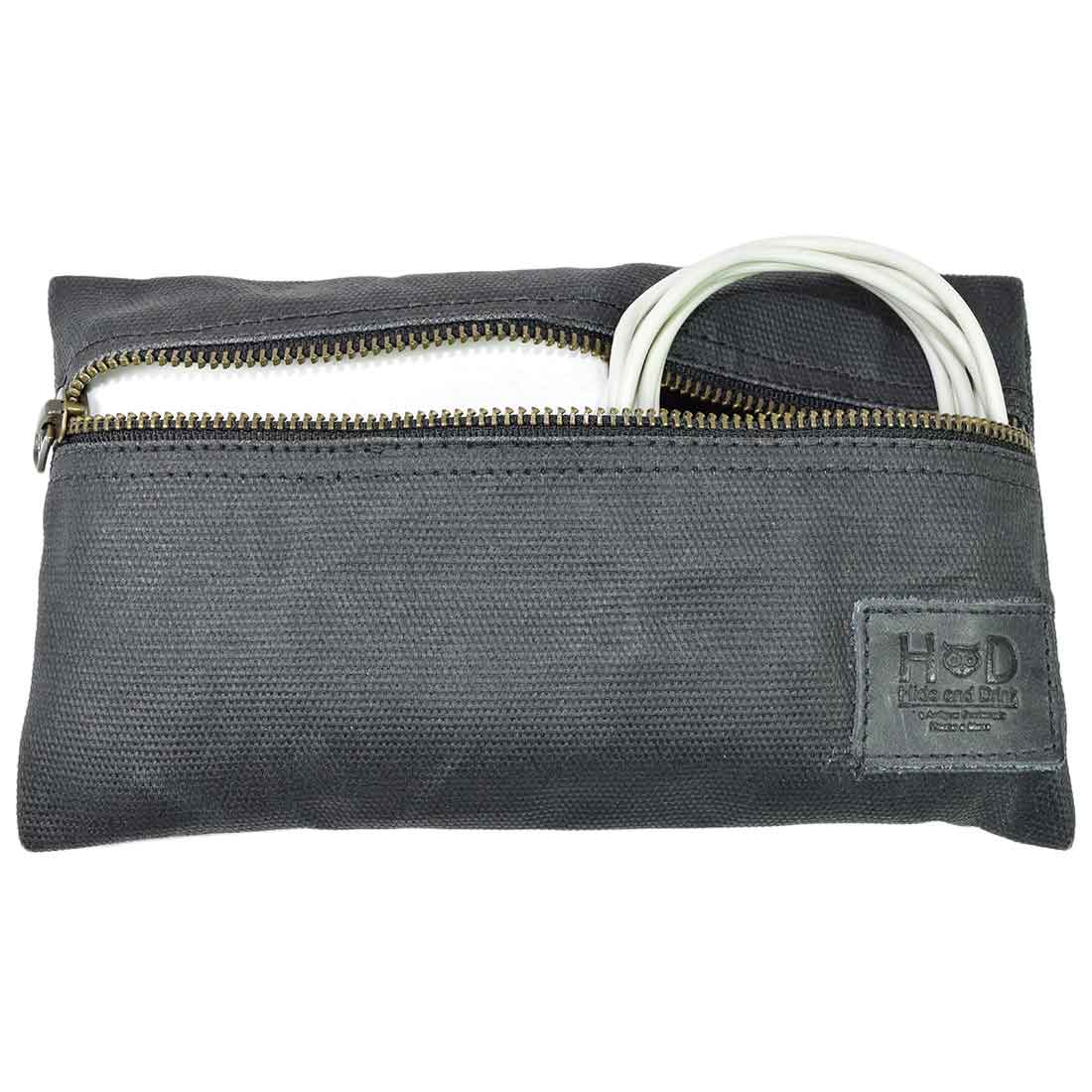 Hide & Drink Utility Cord Pouch showcasing elegance and utility, perfect for tech enthusiasts. As an all-purpose utility & charger case for MacBook, iPad & Laptop, it brilliantly doubles as a cable organizer, handcrafted in La Antigua Guatemala & Oaxaca Mexico.