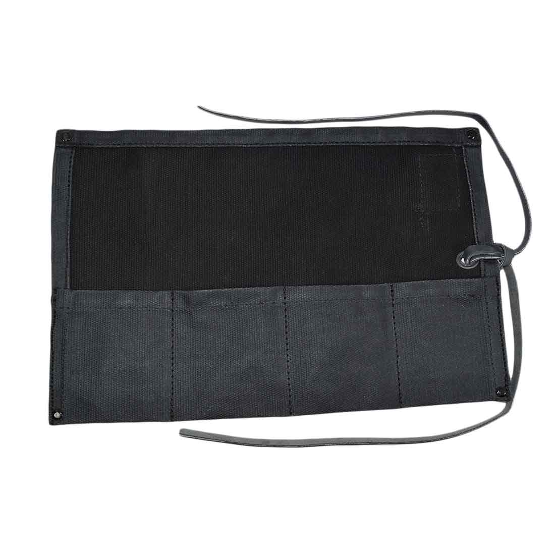 The black version of the Waxed Canvas Watch Roll by Hide & Drink presents a sleek design for organizing watches. This handmade piece is both stylish and functional.