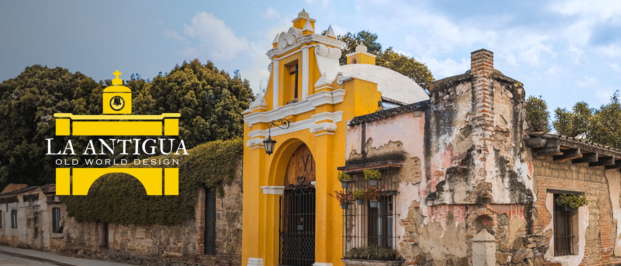 A vibrant view of a yellow Colonial building with intricate architectural details, showcasing the charm of La Antigua - Old World Design.