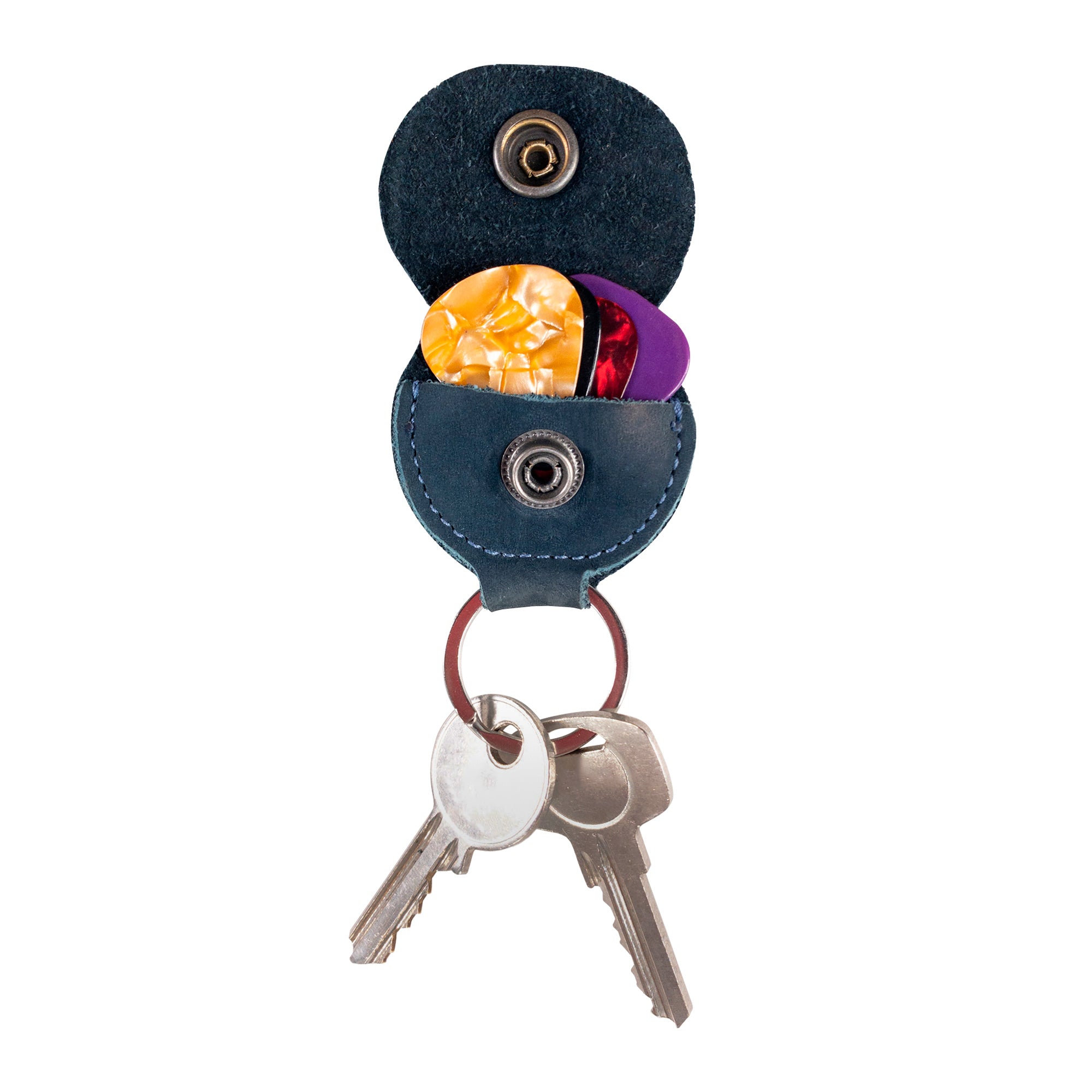 Hide & Drink Key Chain & Guitar Pick Holder, a handmade Full Grain Leather key organizer featuring a unique design with secure pick storage. Perfect for guitar players, this artisan product is hand cut and sewn, showcasing small batch production from La Antigua Guatemala & Oaxaca Mexico.