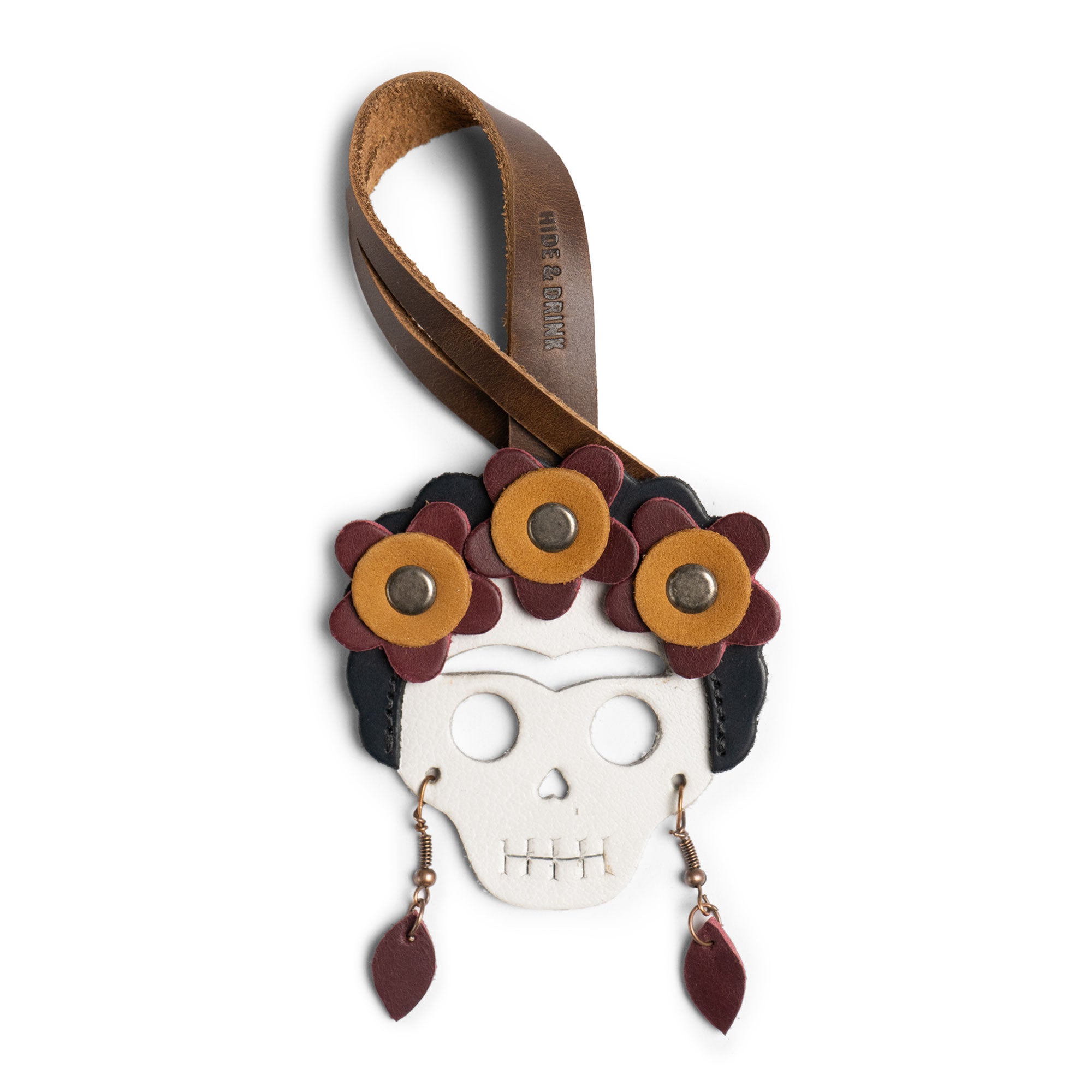 Hide & Drink Bag Charms featuring a strawberry design, an ideal charm for handbags. This accessory serves as a purse charm for tote & backpacks crafted from high-quality full grain leather, demonstrating StockyardX's commitment to small batch production. Each piece represents meticulous hand cut, hand sewn artistry and fire branding, handmade in La Antigua Guatemala & Oaxaca Mexico.