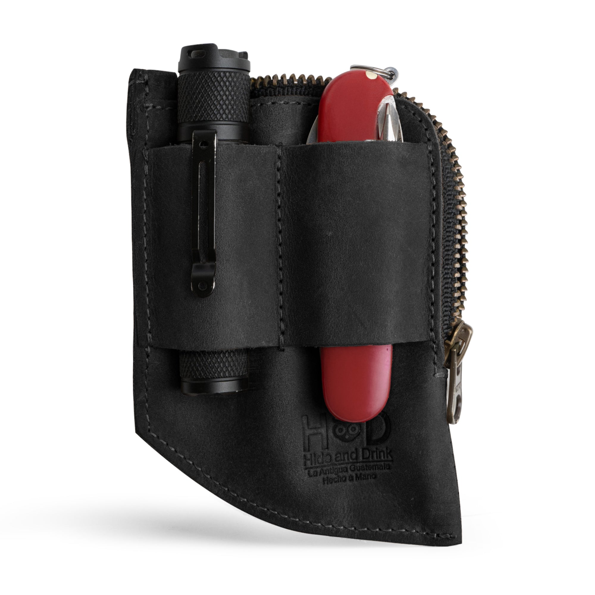 Hide & Drink EDC Pocket Wallet in action, illustrating its use with cash and a pen, designed for functionality as a curved cash organizer and practical everyday accessory.