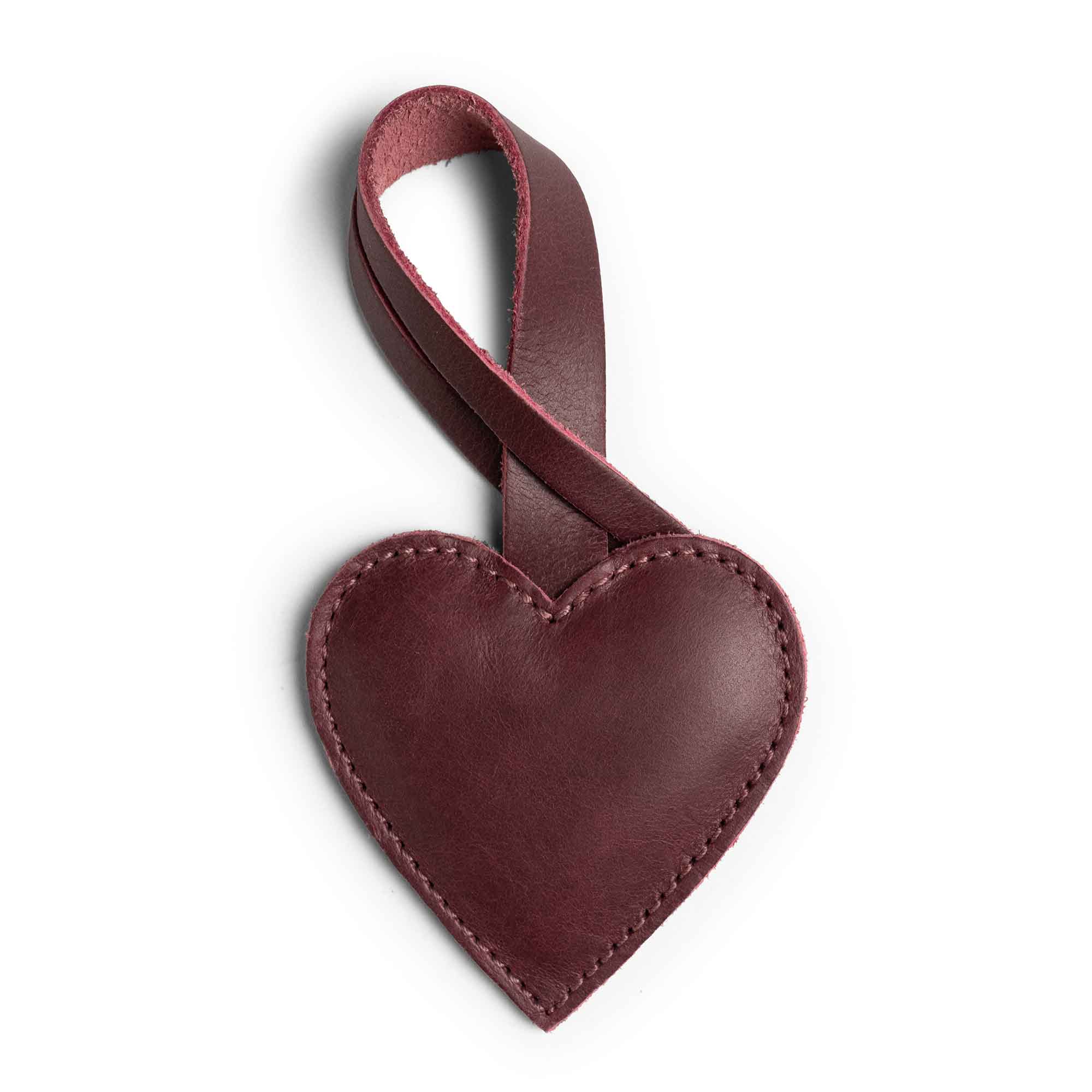 Hide & Drink Bag Charms featuring a lovely moose design, making it an excellent charm for handbags. This purse charm for tote & backpacks is crafted from premium full grain leather, showcasing StockyardX's commitment to small batch production. Each piece highlights meticulous hand cut, hand sewn artistry and fire branding, handmade in La Antigua Guatemala & Oaxaca Mexico.