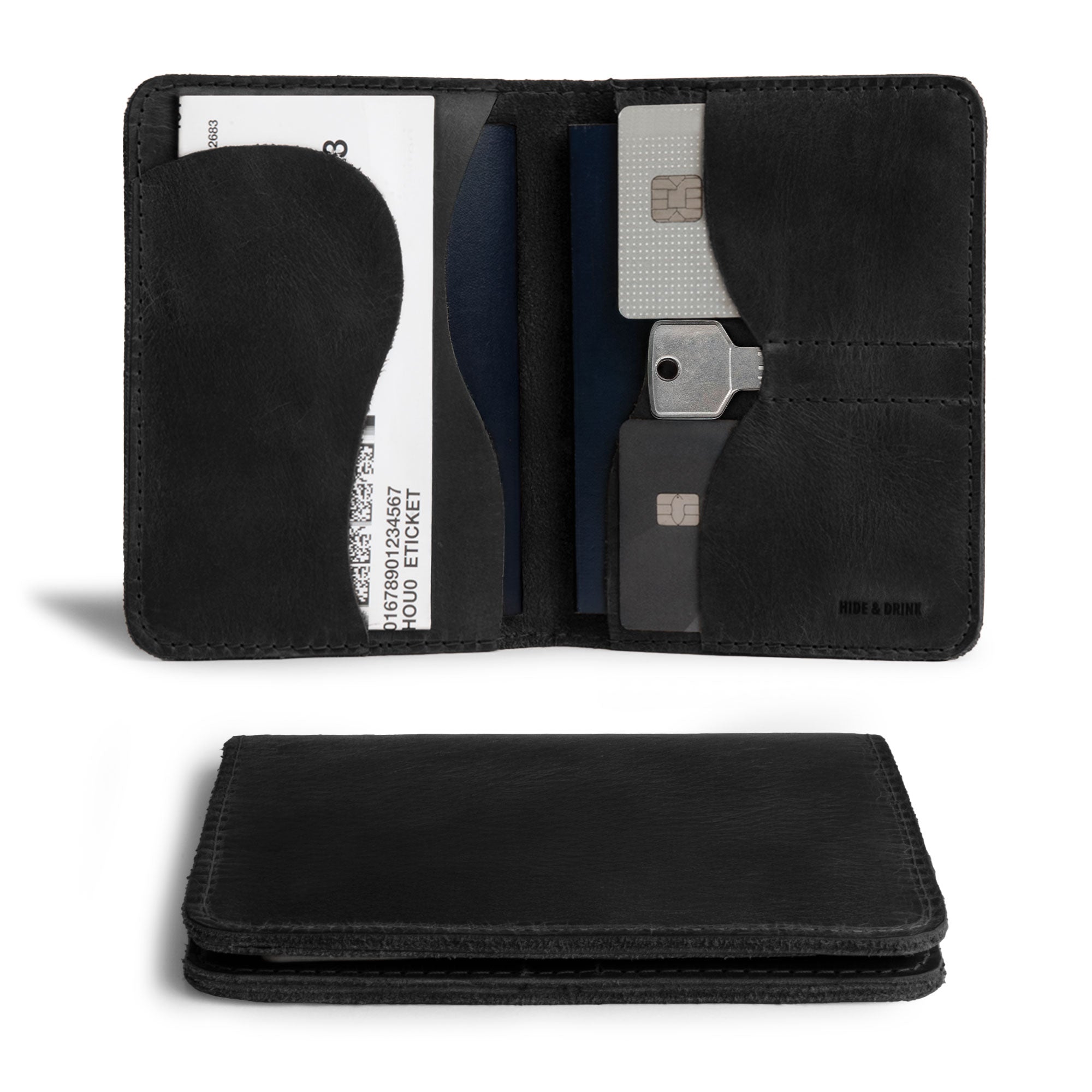 Black version of Hide & Drink's Double Passport Wallet W/Key Slot displaying slots for cards and bills, expertly crafted in a rustic full grain leather, ideal as a travel accessory for organized journeys.