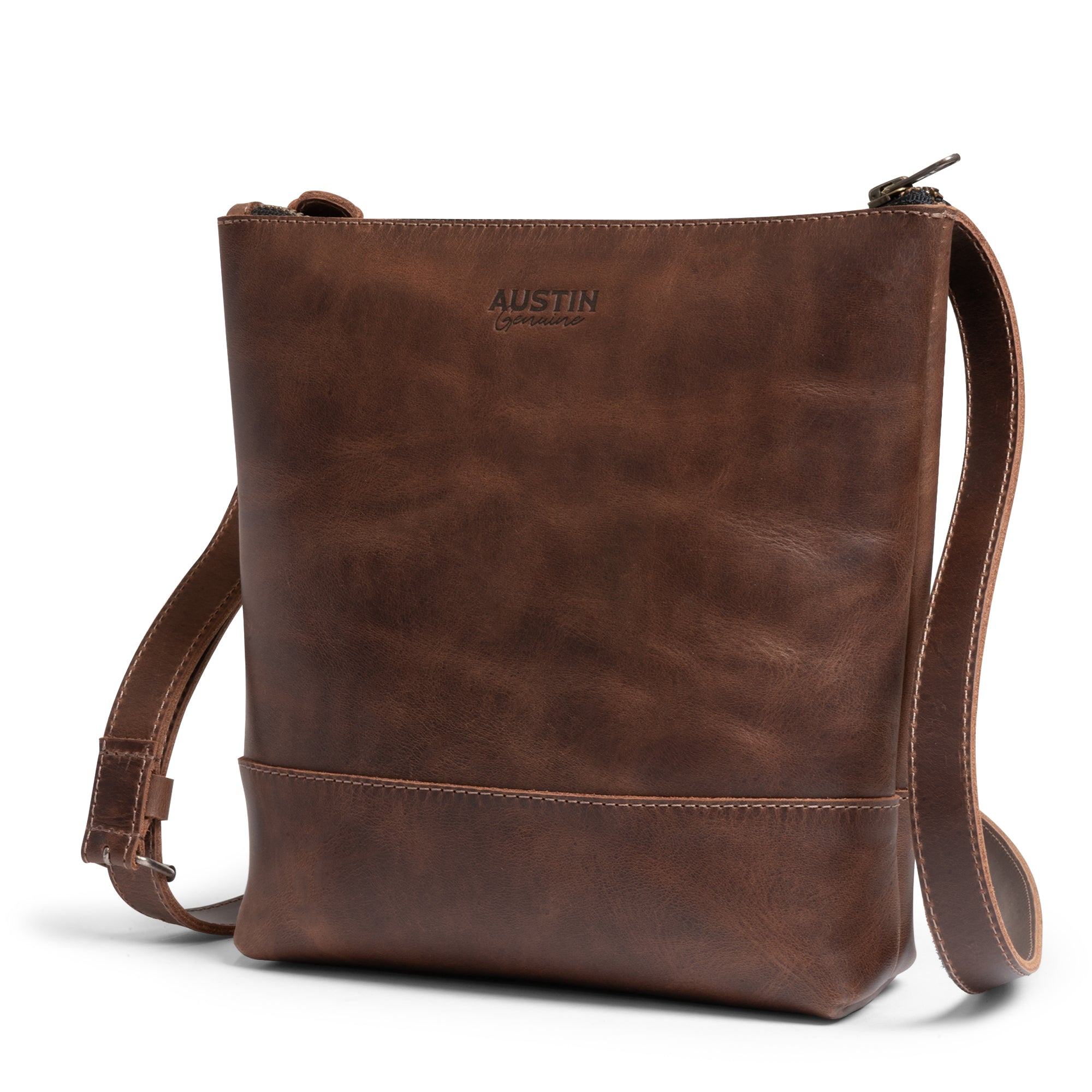 The Zilker Crossbody Bag by Austin Genuine, a sophisticated full grain leather bag that embodies Austin’s bold passion and vibrant culture, showcasing artisan craftsmanship through small batch production, hand cut and sewn in La Antigua Guatemala & Oaxaca Mexico.