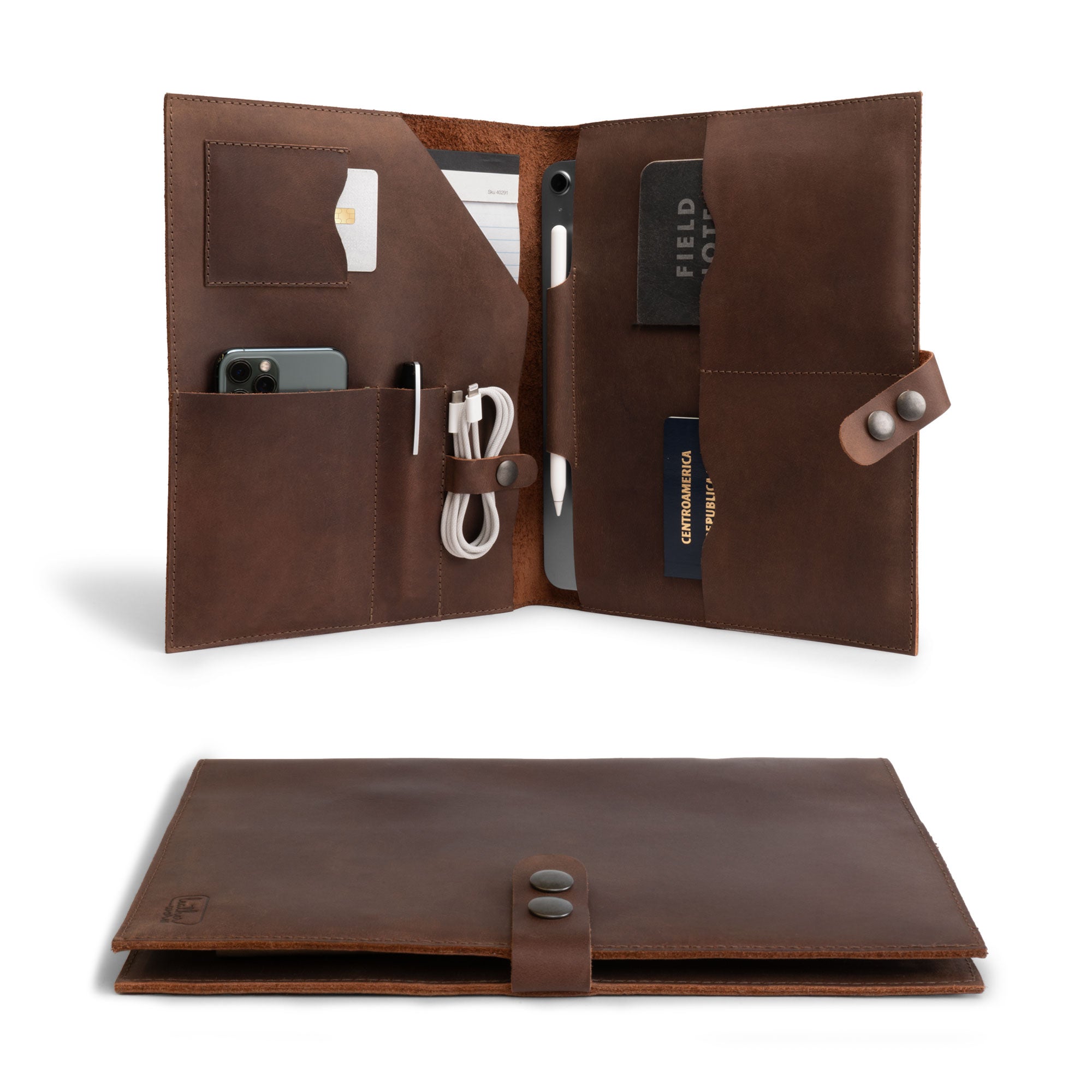 Open view of the Leather Tablet Padfolio by Leather Worx showcasing its Executive Document Folder Holder design with slots for a passport, phone, tablet, notebook, and pen. This Handmade Portfolio Binder is a Professional Business Folio Organizer made from Full Grain Leather, crafted with care in small batches in La Antigua Guatemala & Oaxaca Mexico.