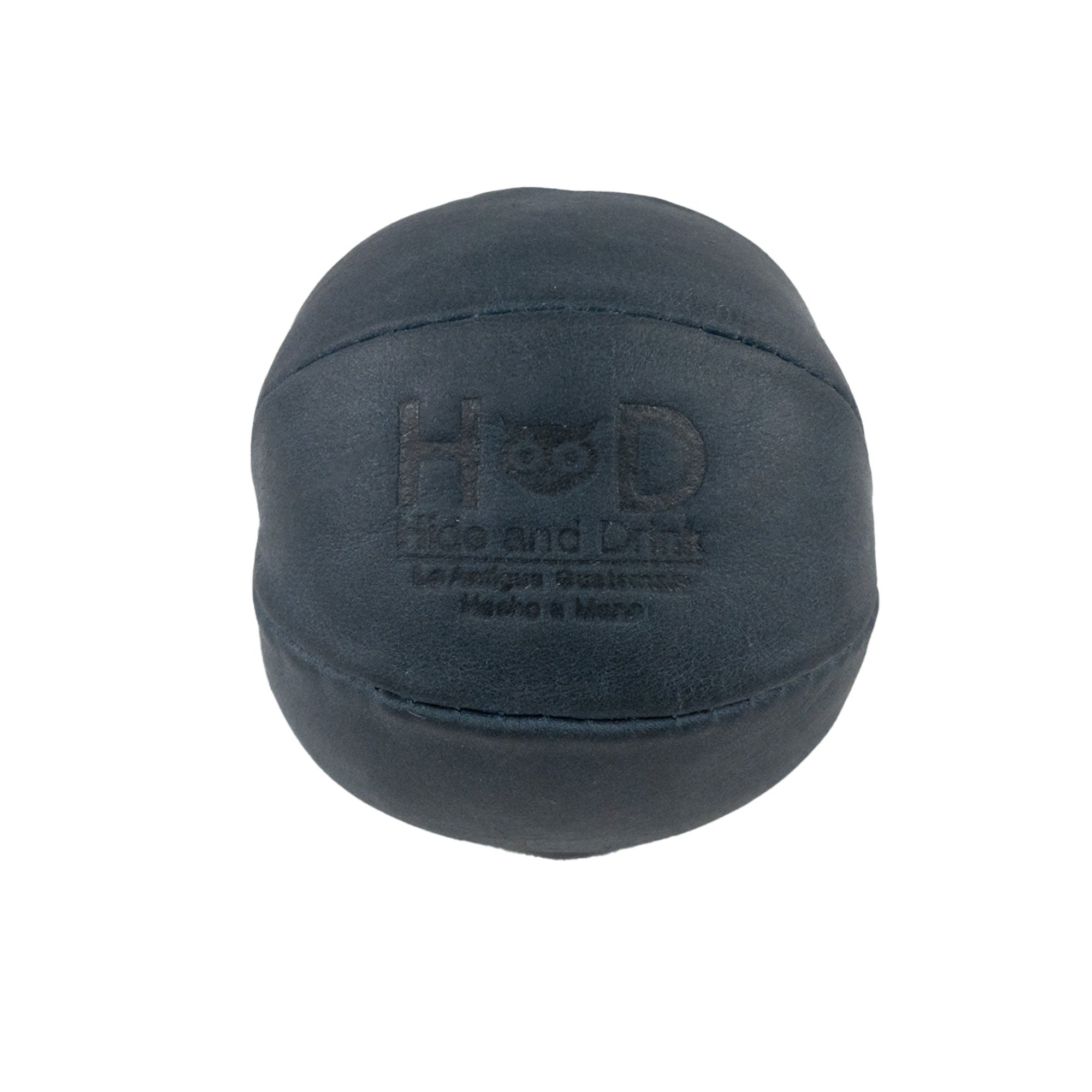 Hide & Drink navy Stress Ball showcasing a smooth texture, designed to relieve fidgeting and anxiety. This squishy tension accessory blends classic style with full grain leather, handmade in La Antigua Guatemala.
