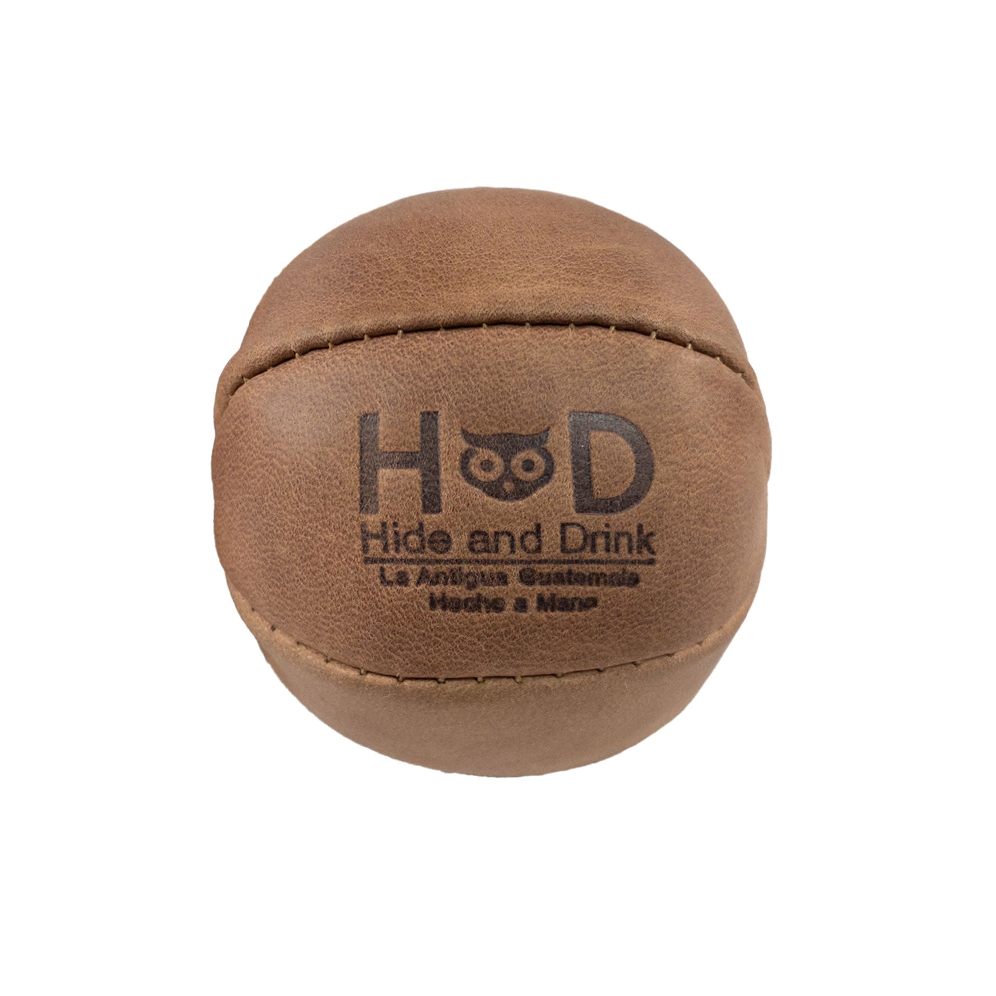 Hide & Drink brown Stress Ball showcasing its rich texture, designed to relieve fidgeting and anxiety. This squishy tension accessory combines classic style with full grain leather, handmade in La Antigua Guatemala.