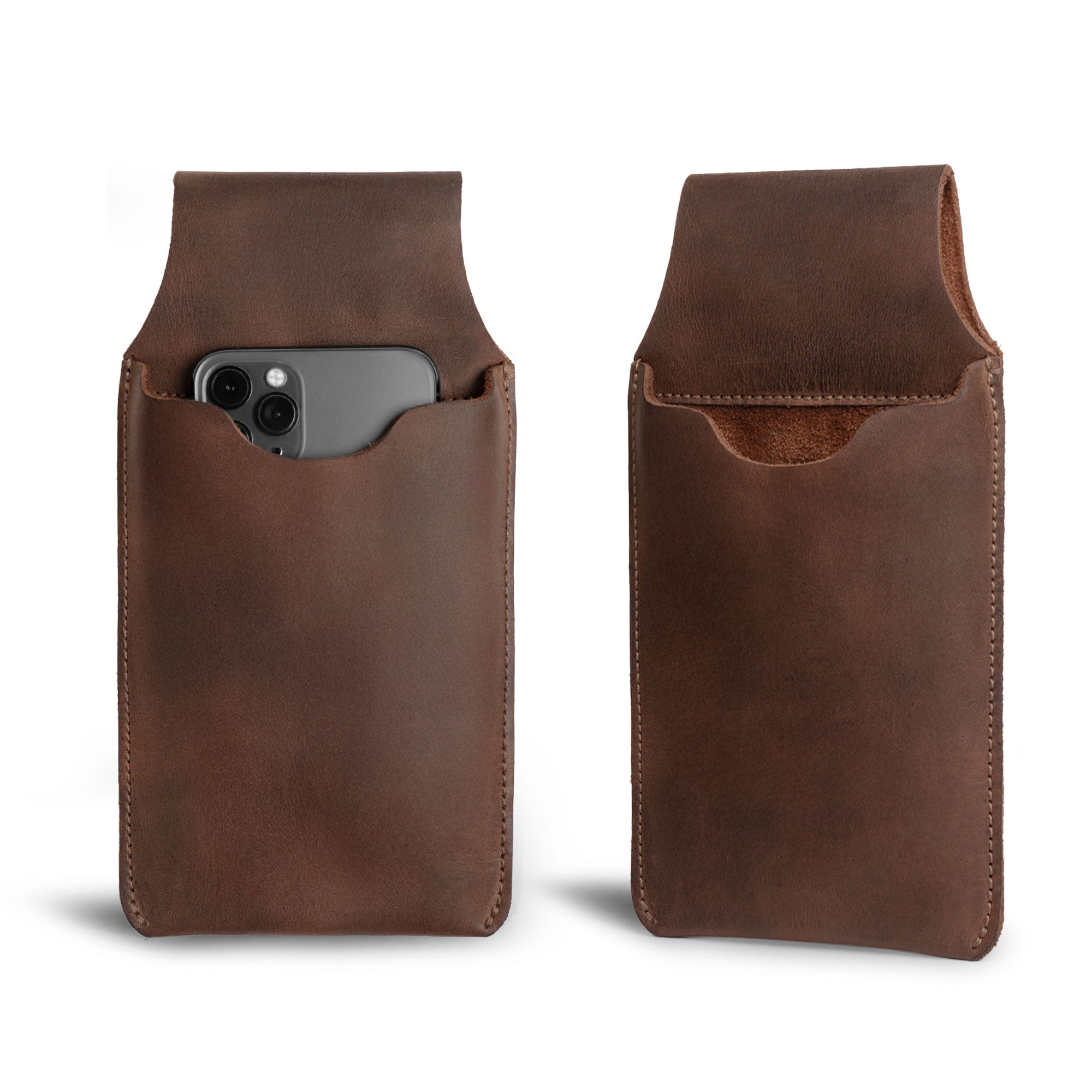 The Hide & Drink Waist Phone Holder displayed on a belt, highlighting its functional design and Full Grain Leather material. This stylish Cellphone Sleeve with Belt Loop for Waist is a reliable phone protector perfect for on-the-go users. Handcrafted by artisans in La Antigua Guatemala & Oaxaca Mexico, it's a testament to small batch production and artisan craftsmanship.