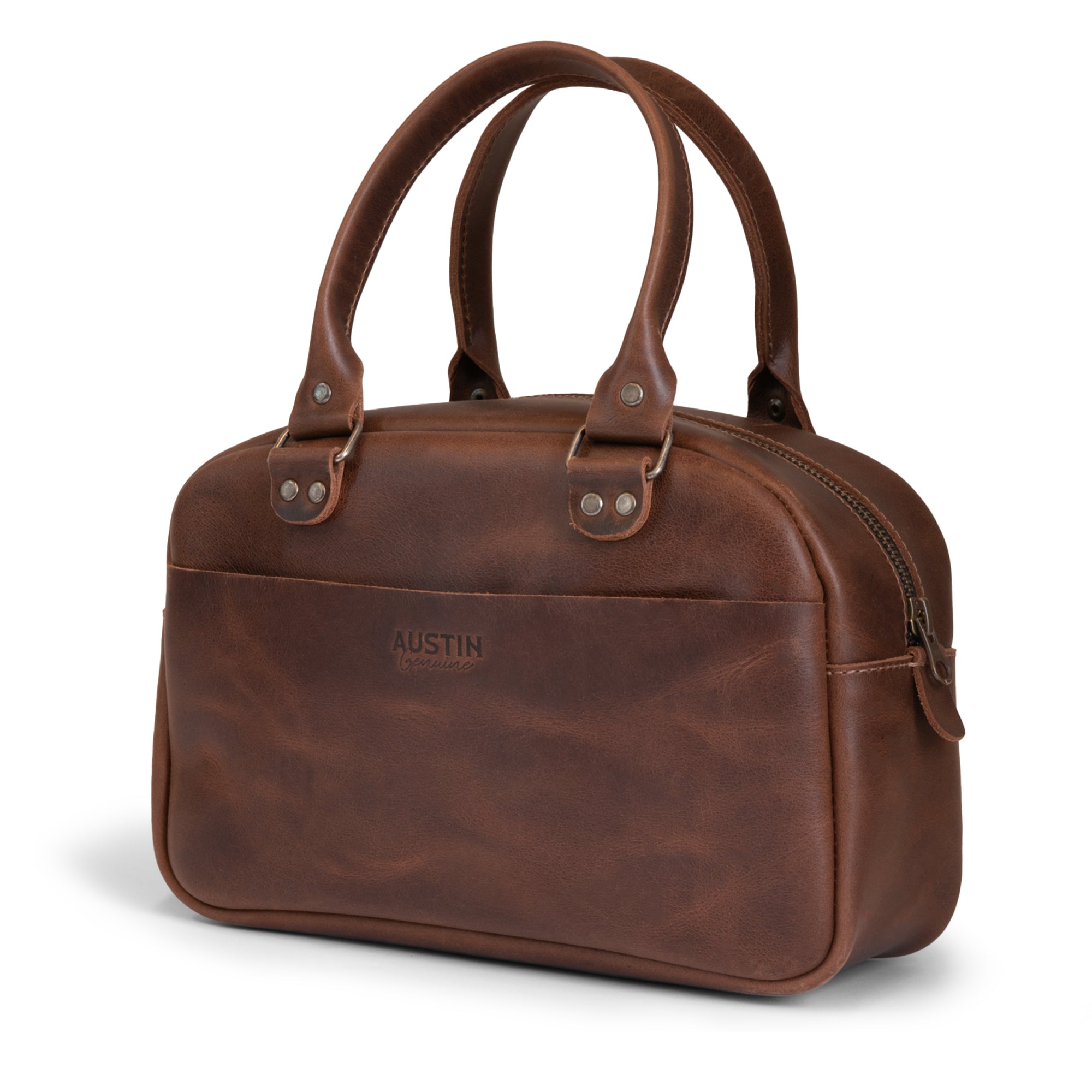 A stylish side view of The Rainey Handbag by Austin Genuine, showcasing its sleek design made from Full Grain Leather. This artisan piece reflects Small Batch Production, with meticulous Hand Cut and Hand Sewn details, featuring a Fire Branded logo crafted by artisans in La Antigua Guatemala & Oaxaca Mexico.
