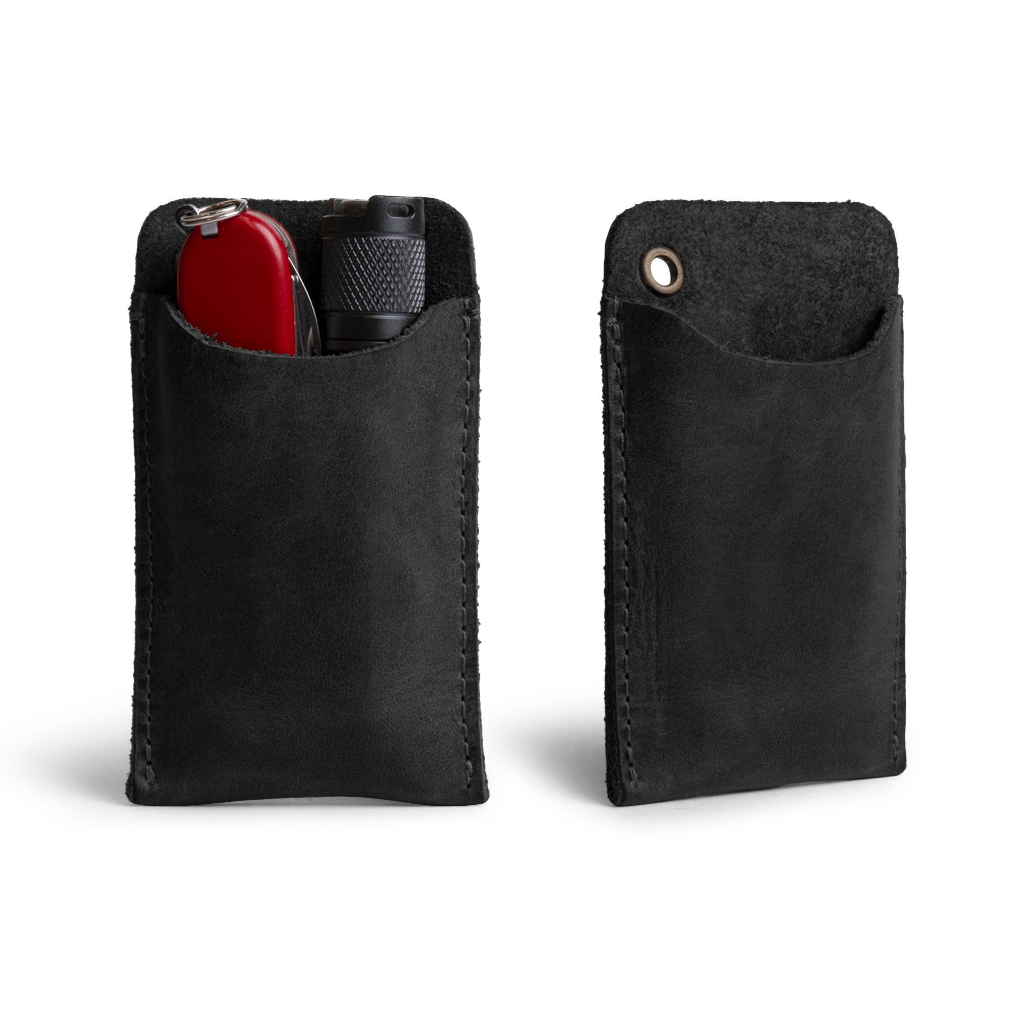 Hide & Drink's Multitool Pocket Sleeve EDC, featuring an elegant black leather design perfect for carrying multitools and pens. This artisan-crafted small tool organizer is hand cut and sewn in La Antigua Guatemala, representing exceptional craftsmanship.