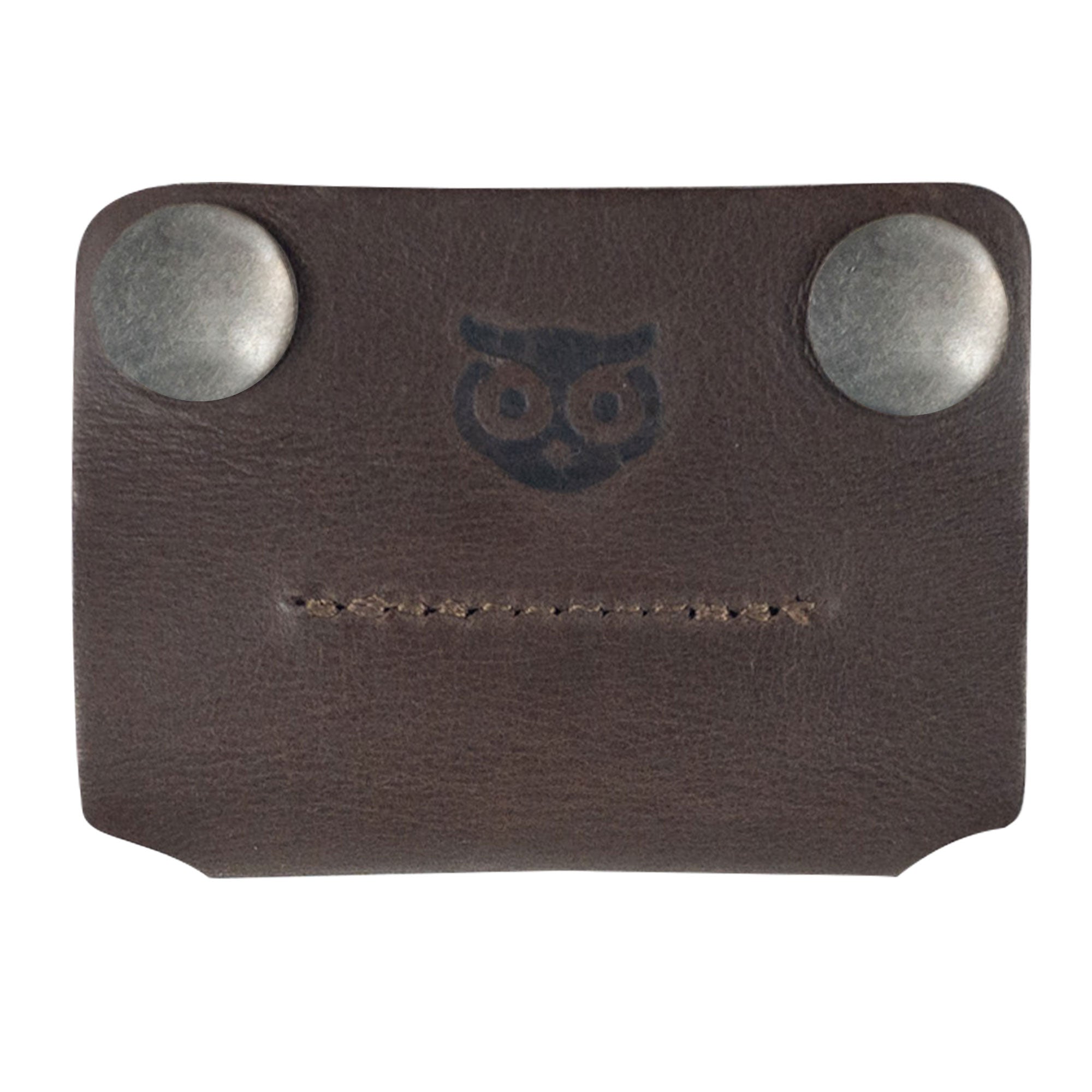 Hide & Drink Sandwich Cord Keeper made of rustic leather, perfect for organizing your wires in a bag or pocket. Features full grain leather in small batch production, hand cut, and artisan design. Ideal for tangle-free cord management.