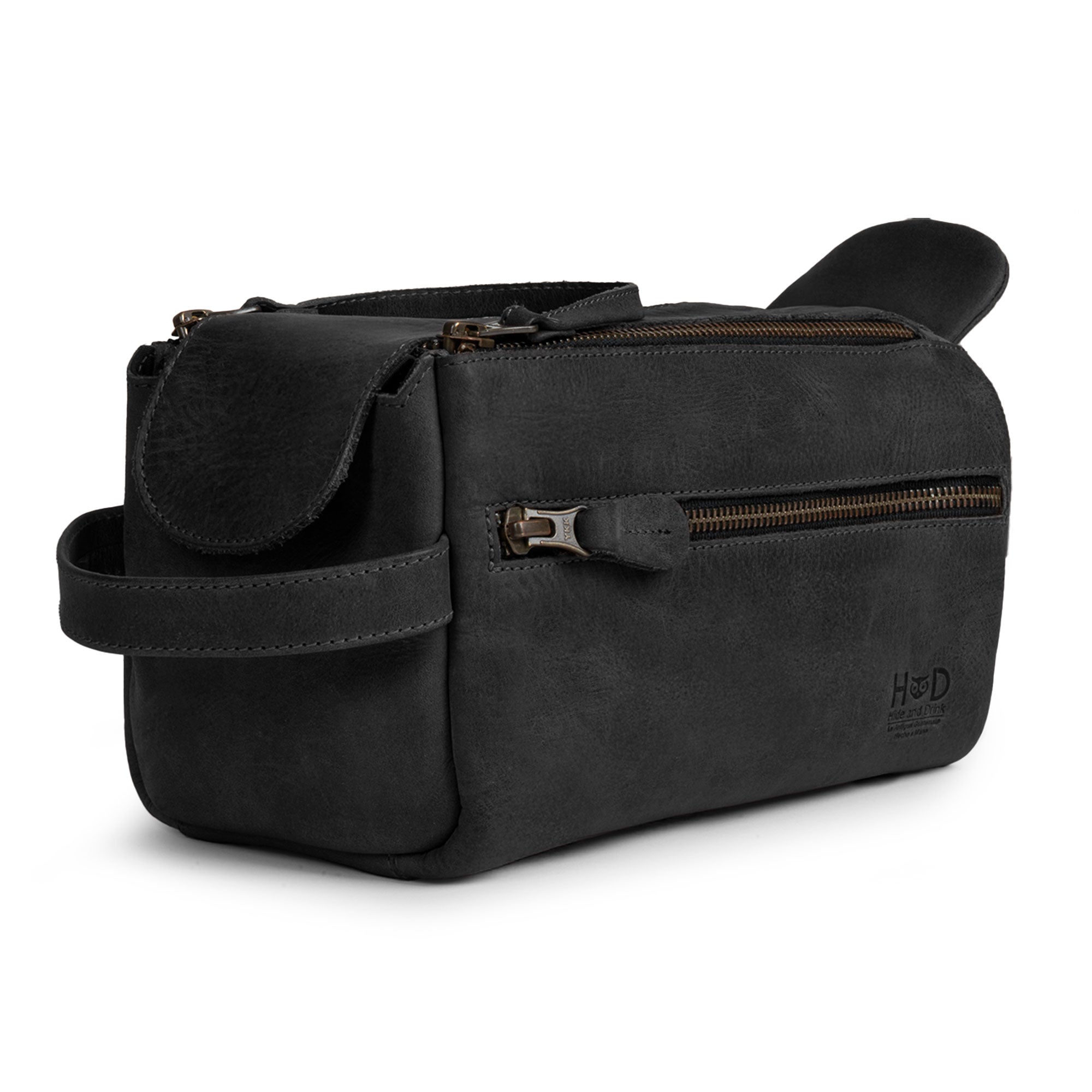 Hide & Drink's Toiletry Bag in sleek black leather, highlighting its elegance. This Full Grain Leather Toiletry Bag makes for a chic Hand Bag or Dopp Kit Organizer for all your essentials. StockyardX, Handmade, S.