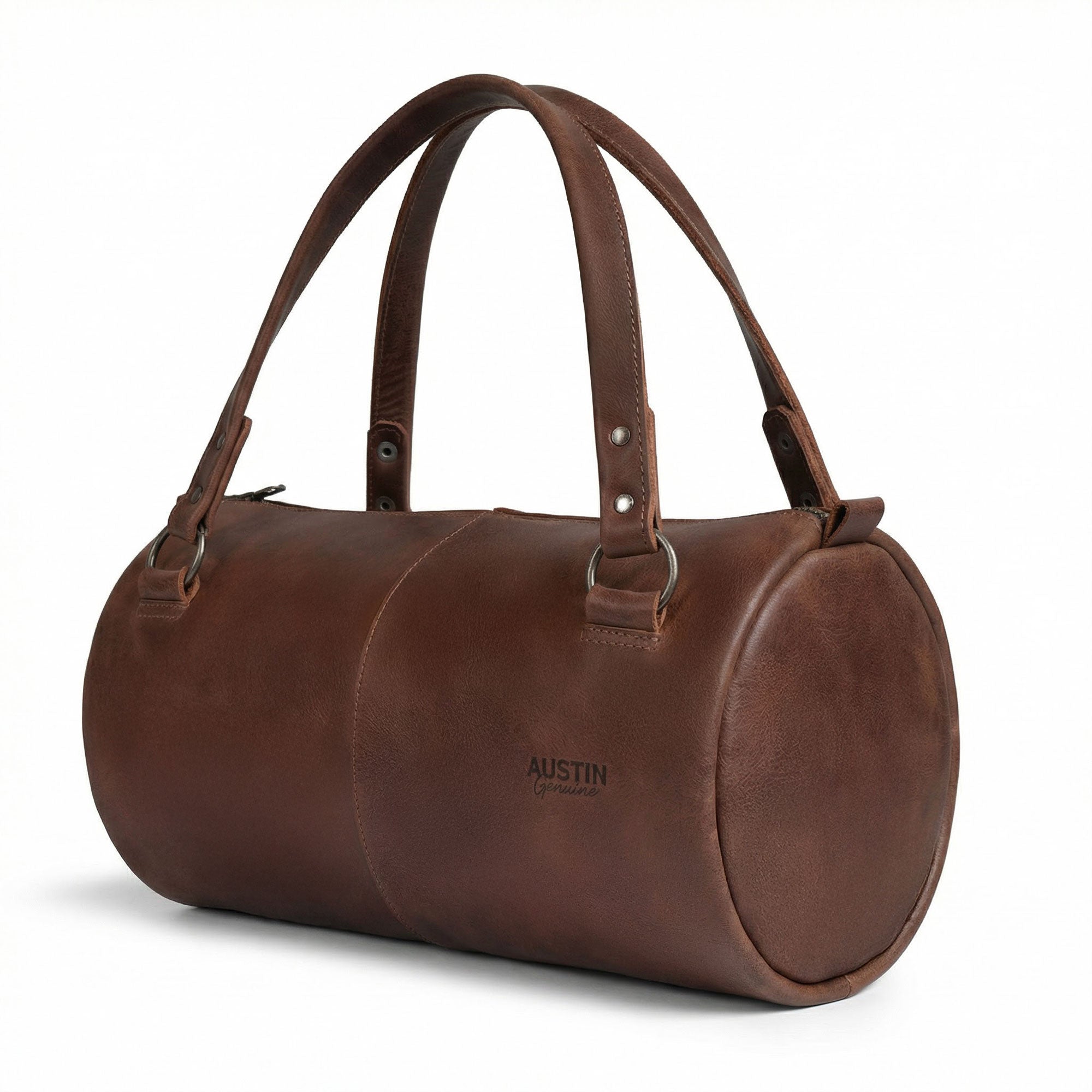 The Rosedale Mini Duffle Bag Handbag by Austin Genuine showcases a rich brown full grain leather exterior, emphasizing its handmade quality with features like hand cut, hand sewn, and fire branded details. Ideal for those who appreciate artisan craftsmanship, this bag represents small batch production made in La Antigua Guatemala & Oaxaca Mexico.