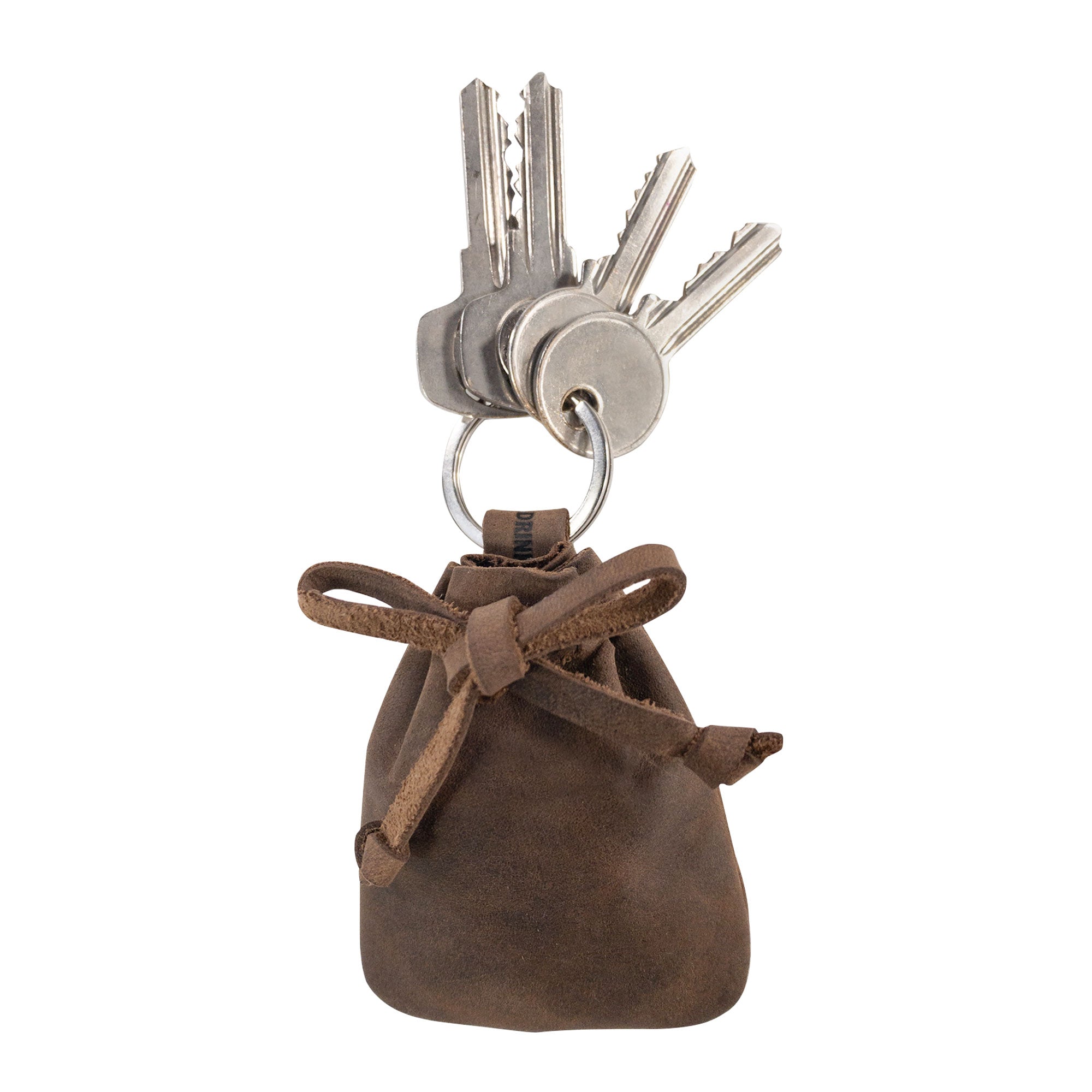 A Mini Medieval Pouch Keychain from Hide & Drink, showcasing a tiny bag with keyring designed from full grain leather, ideal as a coin organizer or coin pouch. This artisan-made product features hand-cut and hand-sewn craftsmanship, with a fire-branded touch, emphasizing small batch production from La Antigua Guatemala.