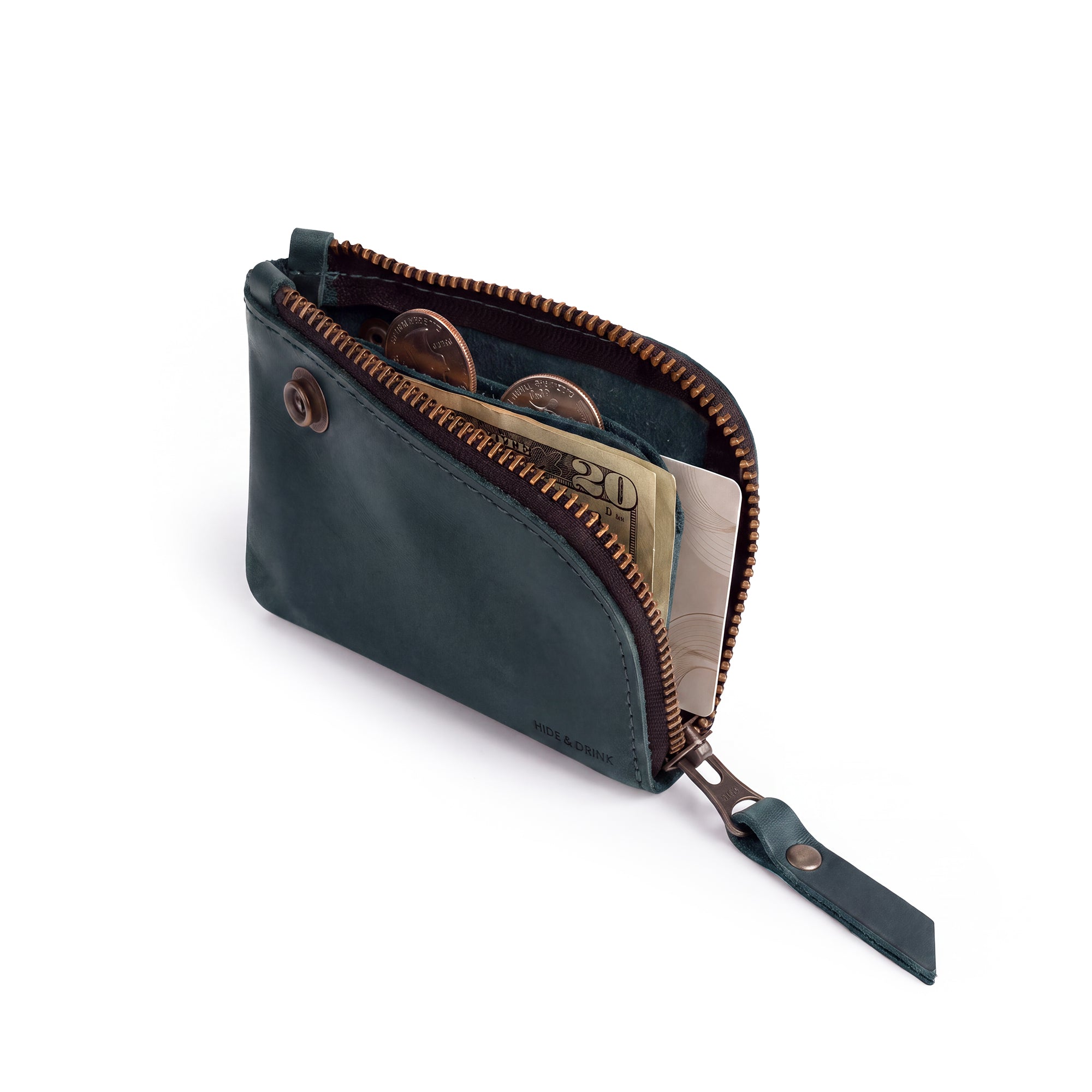 Inner layout of the Lion's Mane Zippered Wallet by Hide & Drink, showing how it effectively organizes cash and cards, highlighting its artisan handmade qualities.