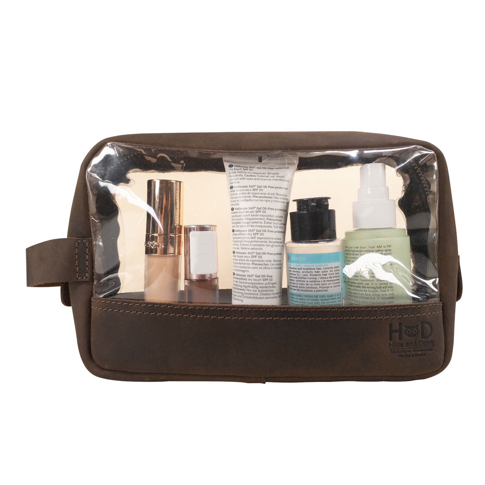 Hide & Drink Transparent Bag for Makeup featuring a clear top for easy viewing of contents, perfect as a travel organizer pouch made from Full Grain Leather, showcasing small batch production and artisan craftsmanship, handmade in La Antigua Guatemala & Oaxaca Mexico.
