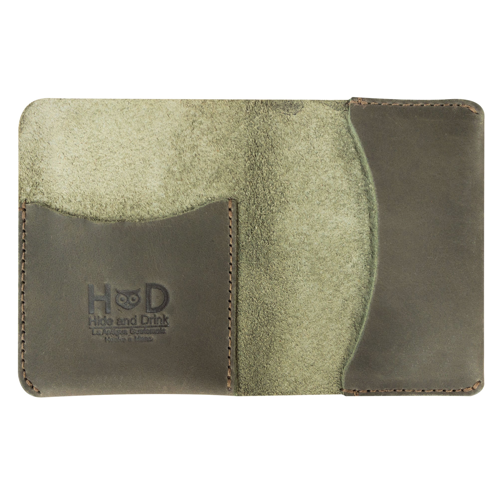 A man using Hide & Drink's Bifold Slim Card Holder, illustrating its compact design for easy credit card storage. This wallet is crafted from full grain leather and doubles as a stylish money organizer, handmade in La Antigua Guatemala.