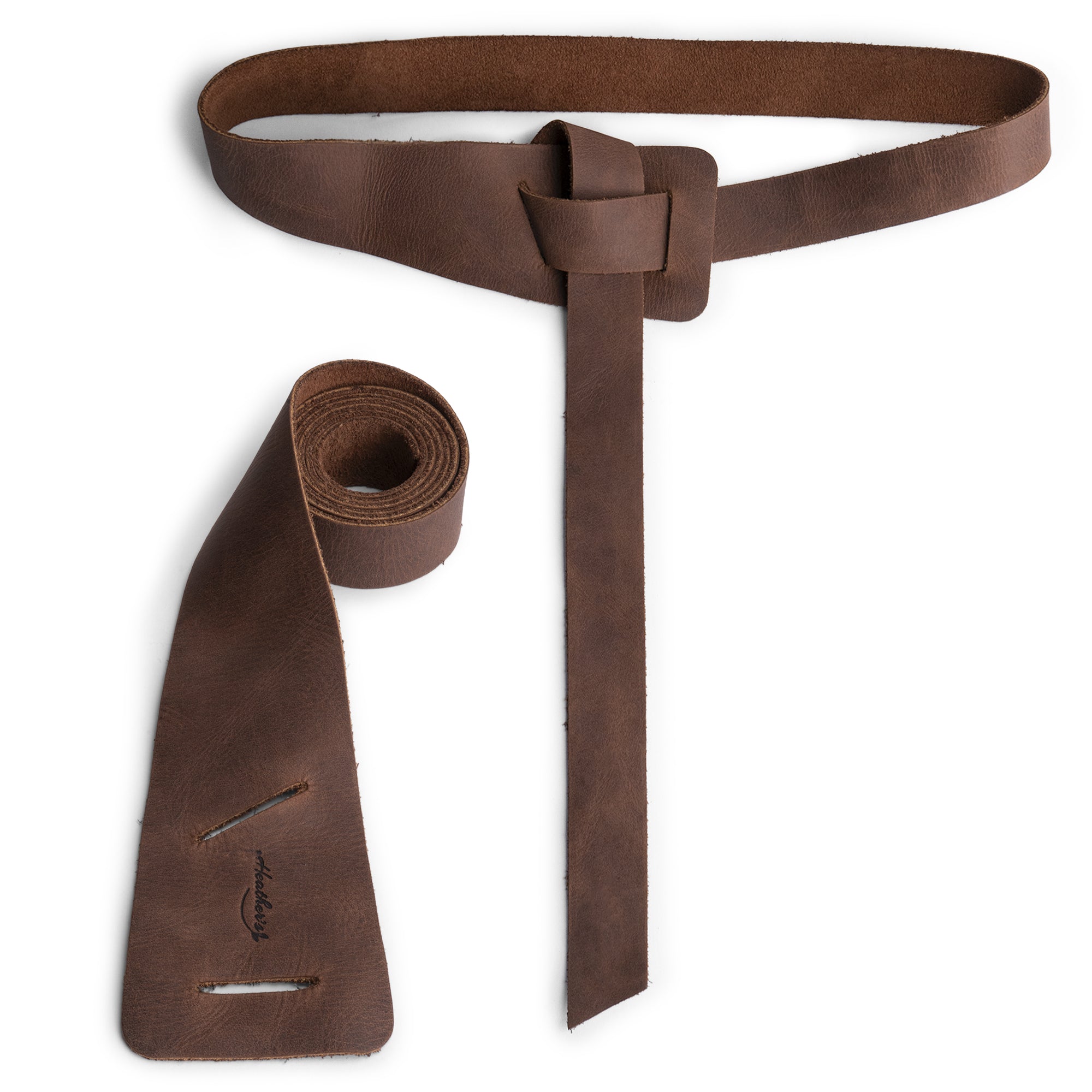 Heather's Formal Belt for Women, showcasing a stylish and versatile design made of Full Grain Leather. Ideal as a Waist Strap, this artisan belt highlights Small Batch Production with hand cut and hand sewn details, featuring a unique fire branded finish. Handmade in La Antigua Guatemala & Oaxaca Mexico.