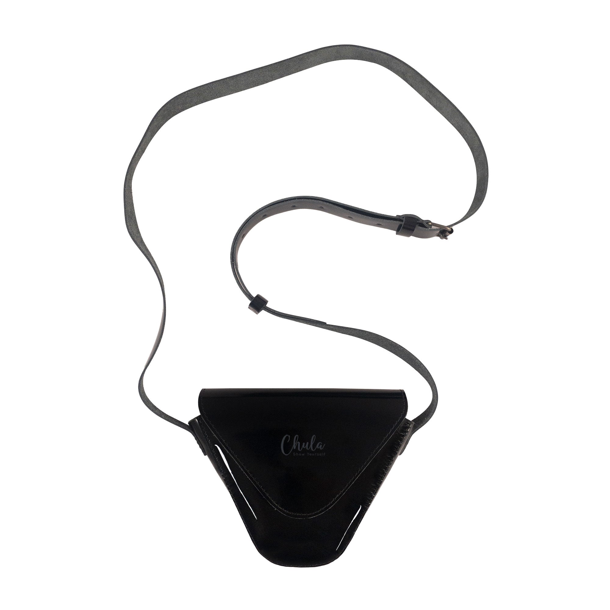 Chula Triangular-Shaped Small Shoulder Bag featuring an adjustable strap, ideal as a crossbody bag or messenger bag. This travel accessory is crafted from full grain leather, showcasing artisan craftsmanship with small batch production. Handmade in La Antigua Guatemala & Oaxaca Mexico.