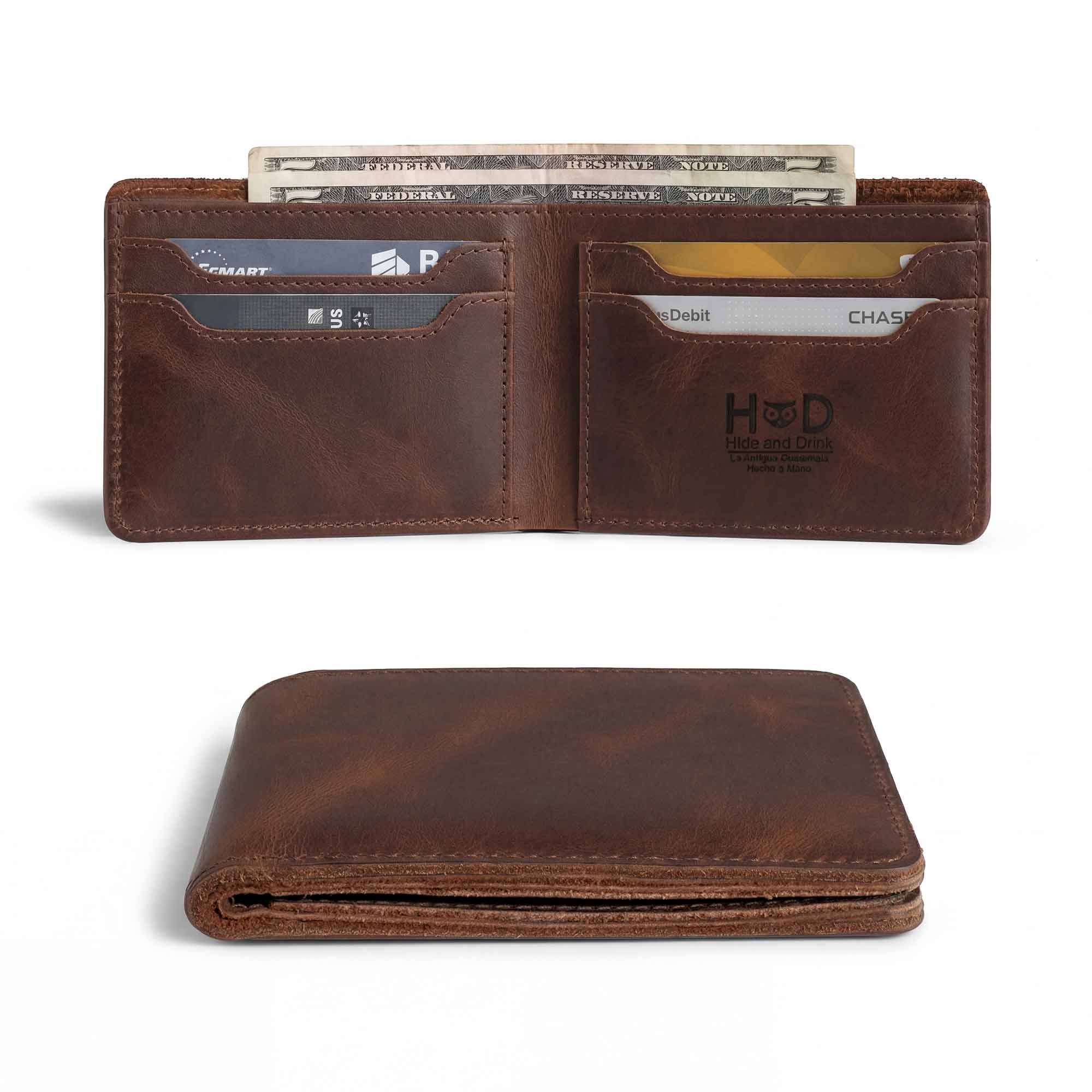 Classic Wallet from Hide & Drink displayed open with cash included, showcasing its multiple card slots. This Classic Bifold Wallet is made of premium Full Grain Leather, serving as a reliable storage case for identification. A great travel accessory, it reflects artisan craftsmanship through small batch production methods. Hand cut and sewn in La Antigua Guatemala & Oaxaca Mexico.