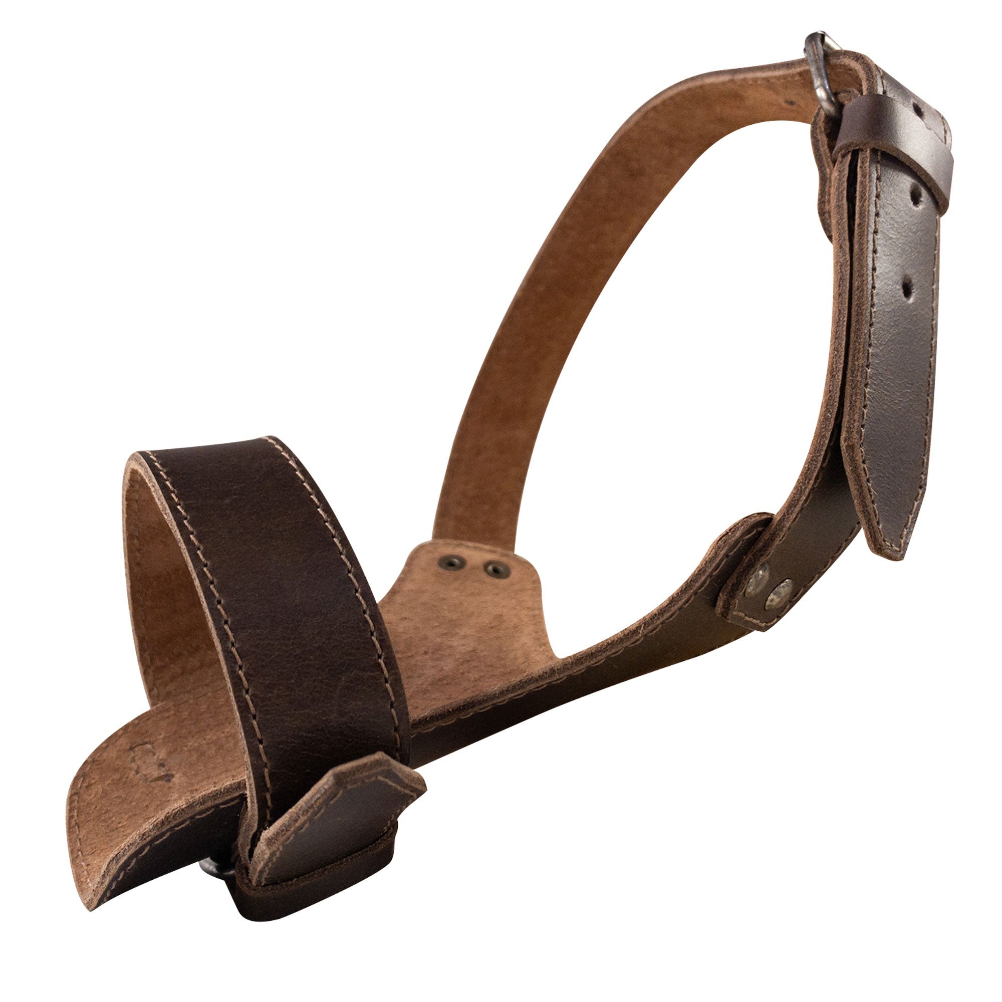 Adjustable Dog Muzzle by Taco Dog showcasing the rustic design, made from soft full grain leather. This pet accessory prevents chewing and serves as an artisan guard for your pet's comfort. Hand cut and hand sewn with small batch production techniques in La Antigua Guatemala.