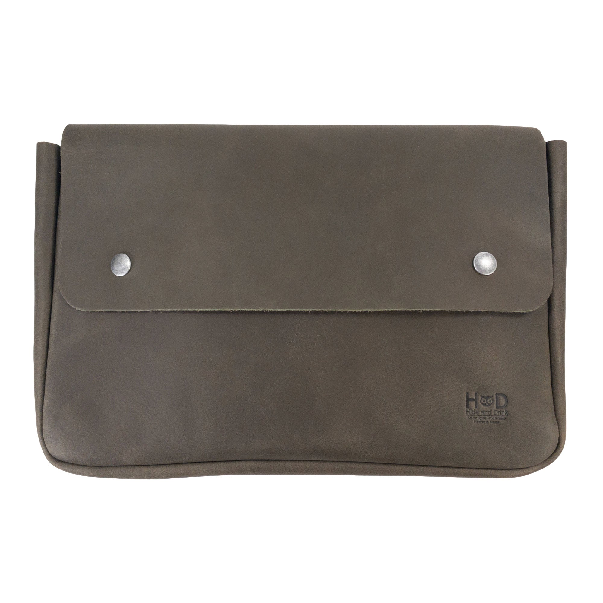 Hide & Drink's Vintage Folder Holder shown from a unique angle to showcase its Handmade Leather design. This Document Holder features a stylish vintage envelope look made from Full Grain Leather, emphasizing the quality of Small Batch Production from La Antigua Guatemala & Oaxaca Mexico.