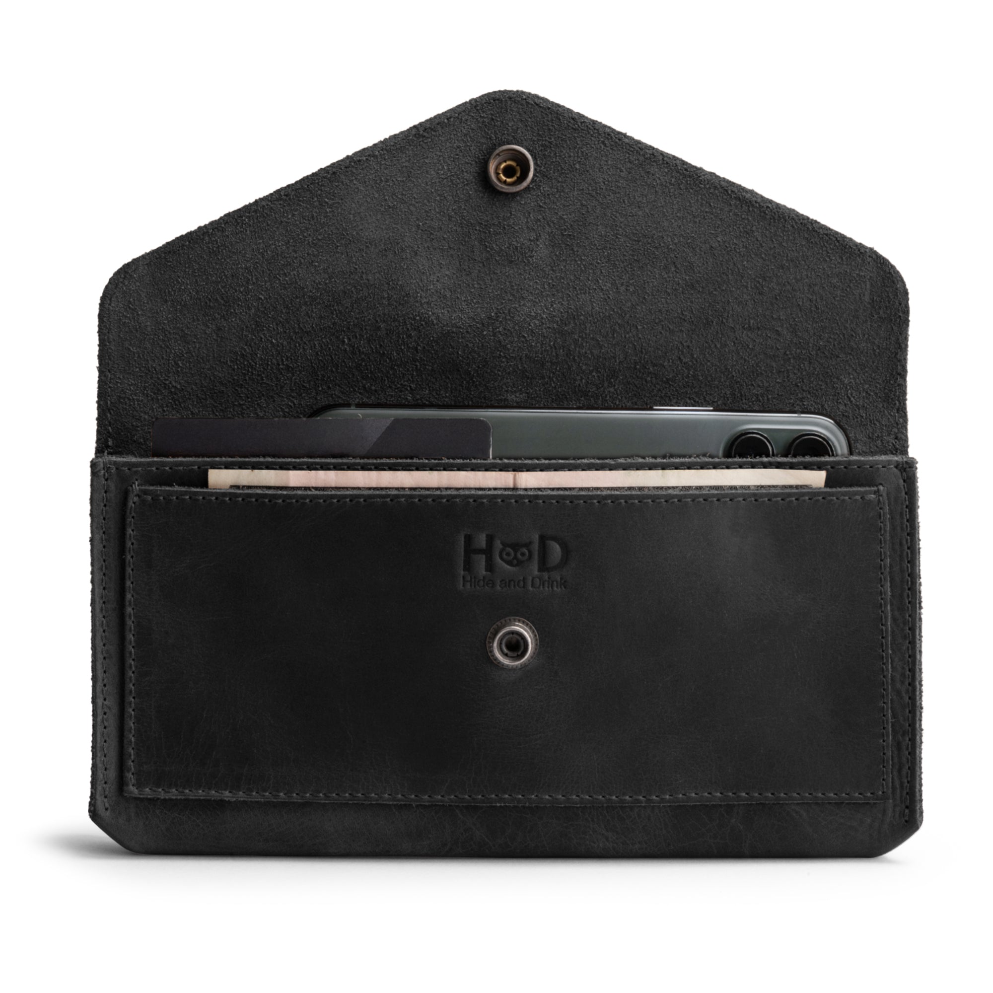 Front view of the Large Female Wallet by Hide & Drink, a stylish Travel Organizer for Women made from Full Grain Leather, featuring a vintage design that showcases craftsmanship from small batch production and handmade methods in La Antigua Guatemala and Oaxaca, Mexico.
