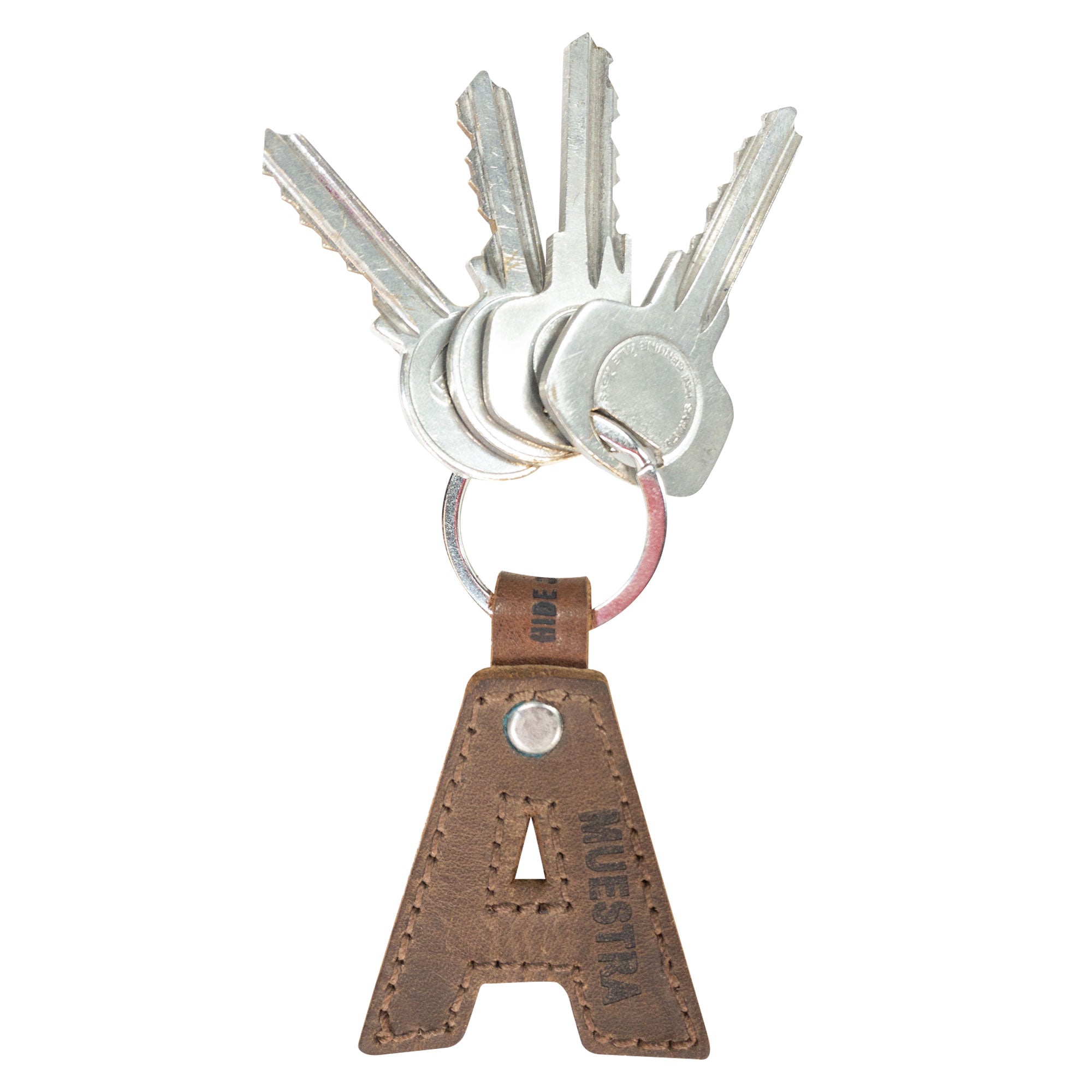 Stylish 'A' Alphabet Letter Keychain attached to keyring showcasing its thick leather design from Hide & Drink. Handmade in La Antigua Guatemala, this keychain is perfect for adding flair to your key collection.