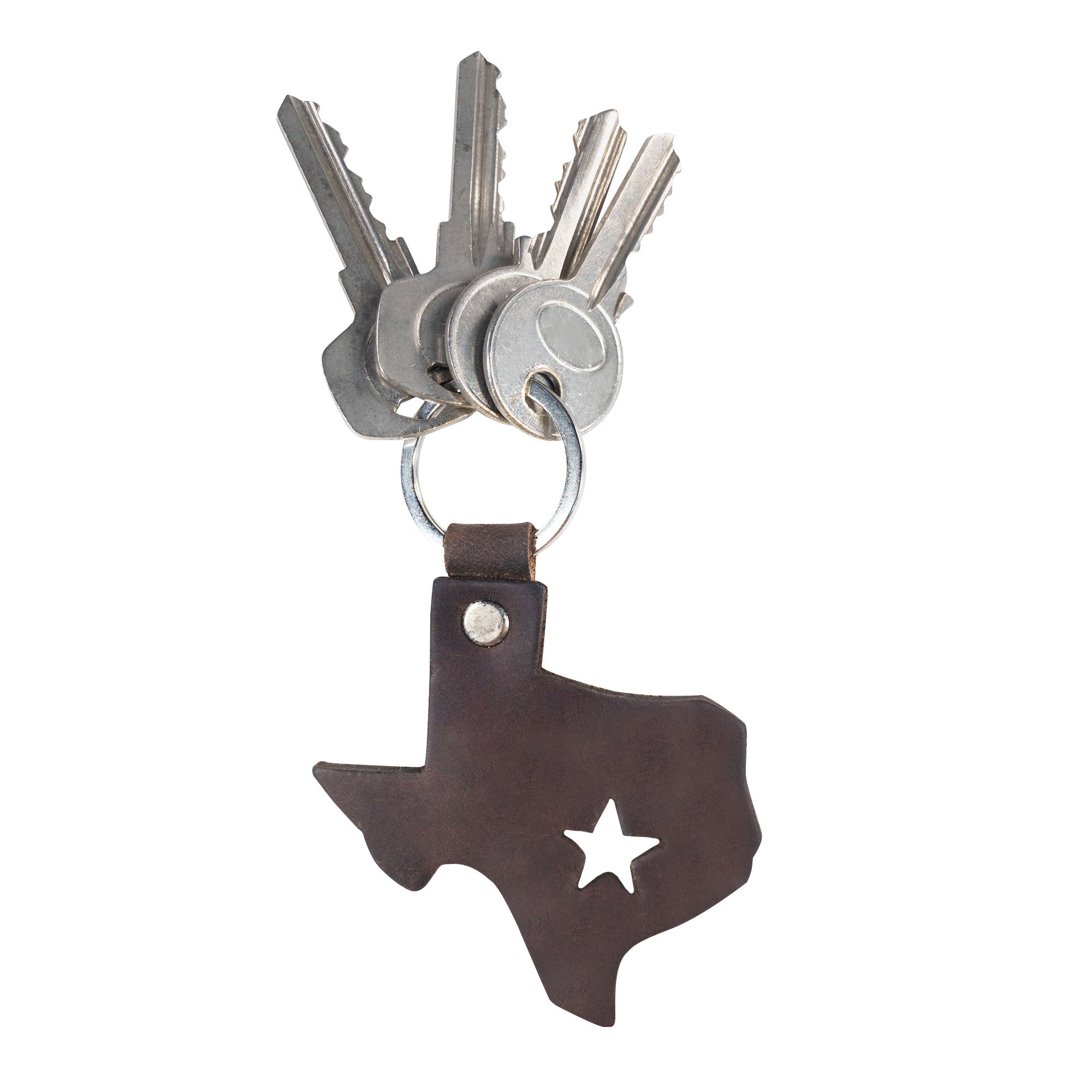 A Texas State Keychain made of thick full grain leather, showcasing the Texas map with a star cutout. This artisan keychain is handcrafted by Hide & Drink and is a perfect Texas souvenir, reflecting small batch production from La Antigua Guatemala & Oaxaca Mexico.