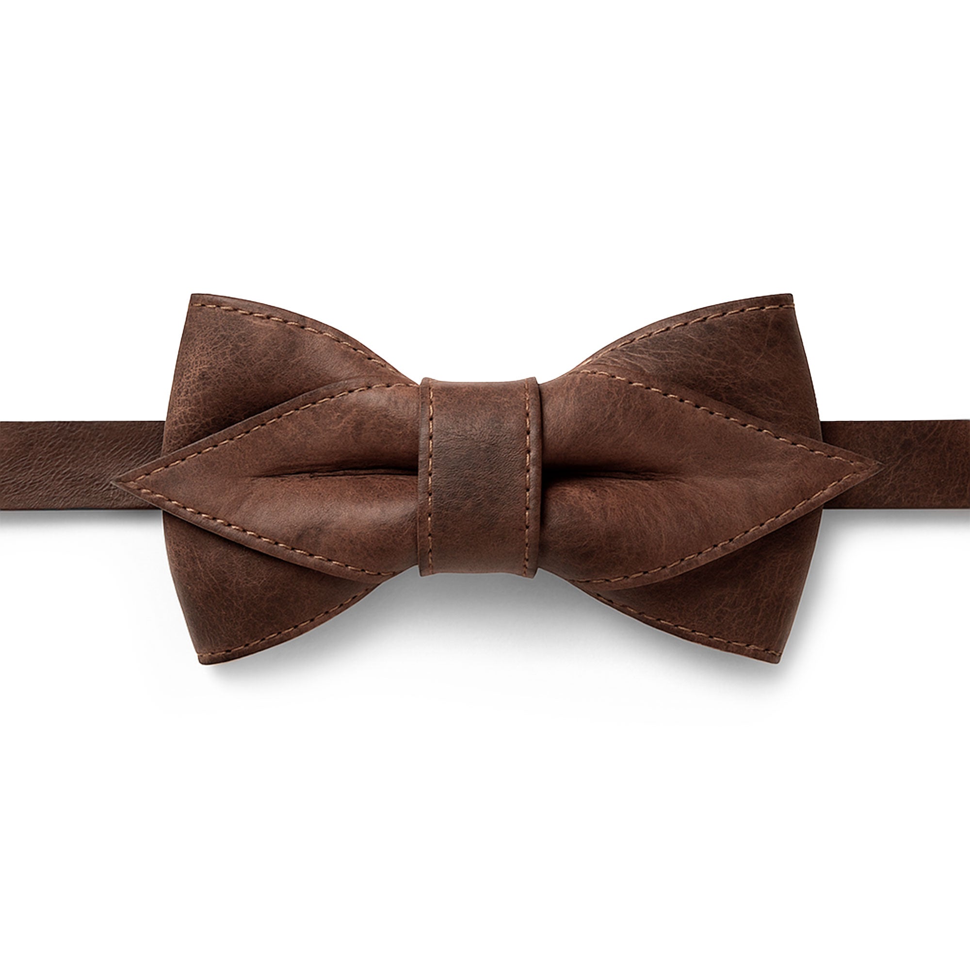 A close-up of a handcrafted Pointed Bow Tie for Groomsmen by Hide & Groom, made of full grain leather. This adjustable pre-tied bow tie is perfect for formal wear for men, showcasing small batch production techniques such as hand-cut and hand-sewn craftsmanship. Artisan-made in La Antigua Guatemala & Oaxaca Mexico.