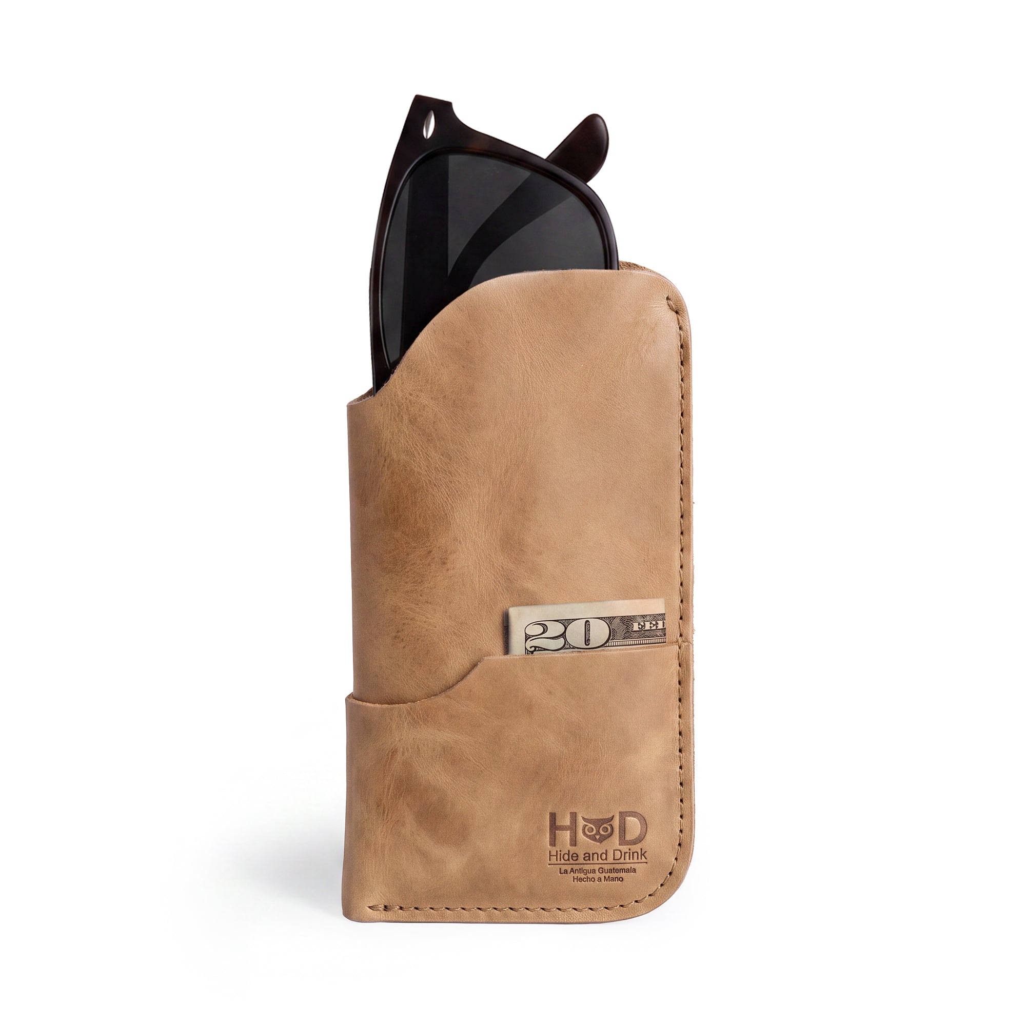 The Hide & Drink Sunglass Case & Wallet featuring a sophisticated dark brown design. This Rustic Sunglasses Case & Wallet is crafted from Full Grain Leather, perfect for keeping your glasses safe while traveling, artisanal quality from La Antigua Guatemala & Oaxaca Mexico.