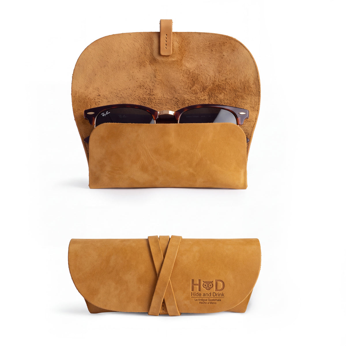 Hide & Drink Leather Sunglass Wrap offers a secure way to store sunglasses, made from high-quality full grain leather. This artisan-crafted eye glasses storage is great for travel and features hand cut and sewn construction in La Antigua Guatemala.