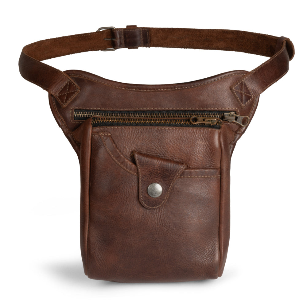 Essential Waist Bag by Hide & Drink, featuring adjustable belt and two zippered pockets, crafted from full grain leather. Perfect for organizing and storing money, this artisan-made bag showcases small batch production techniques, hand cut and hand sewn by skilled artisans in La Antigua Guatemala & Oaxaca Mexico.