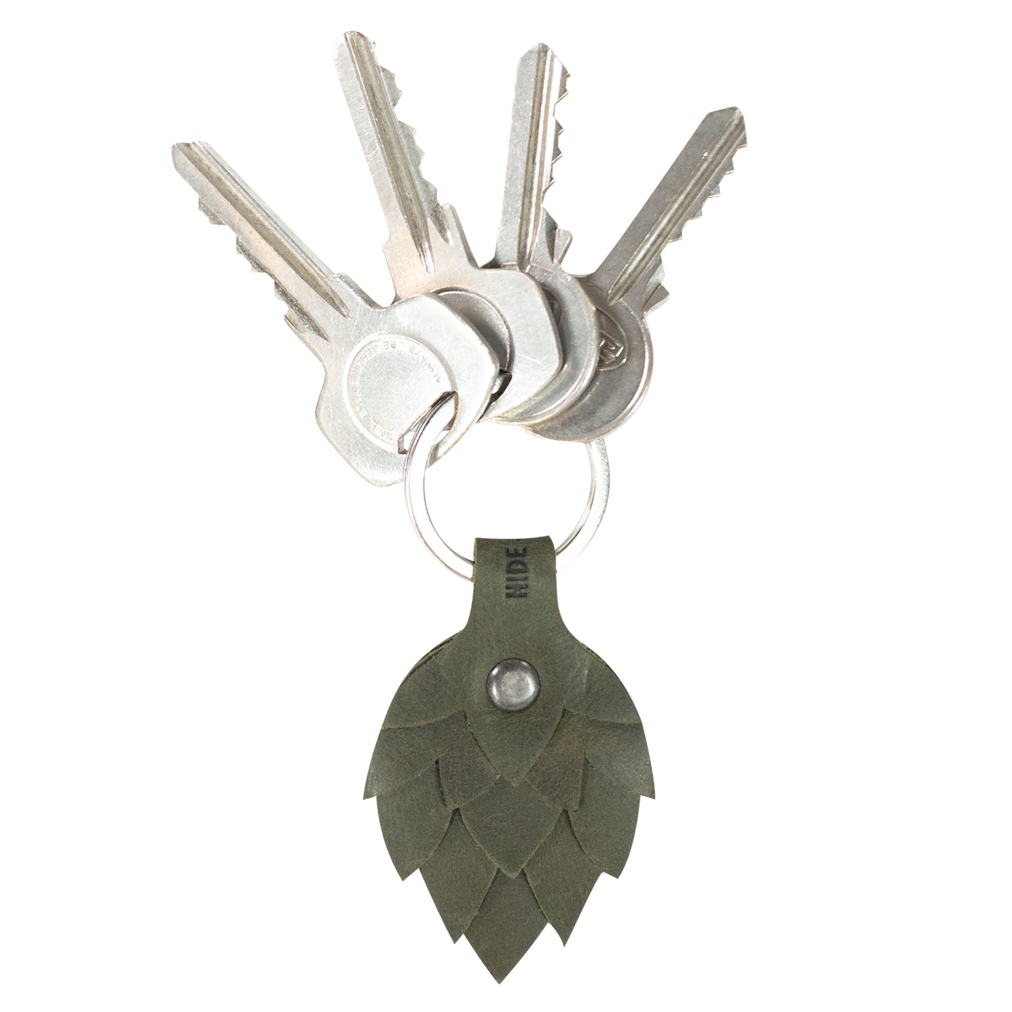 A close-up of the Hop Flower Keychain by Hide & Drink, featuring a unique design that resembles hop flowers, ideal for key ring or holder for beer lovers and brewers. Made from premium Full Grain Leather, this artisan keychain is part of StockyardX’s small batch production and is hand cut, hand sewn, with fire branded detailing, showcasing craftsmanship from La Antigua Guatemala & Oaxaca Mexico.