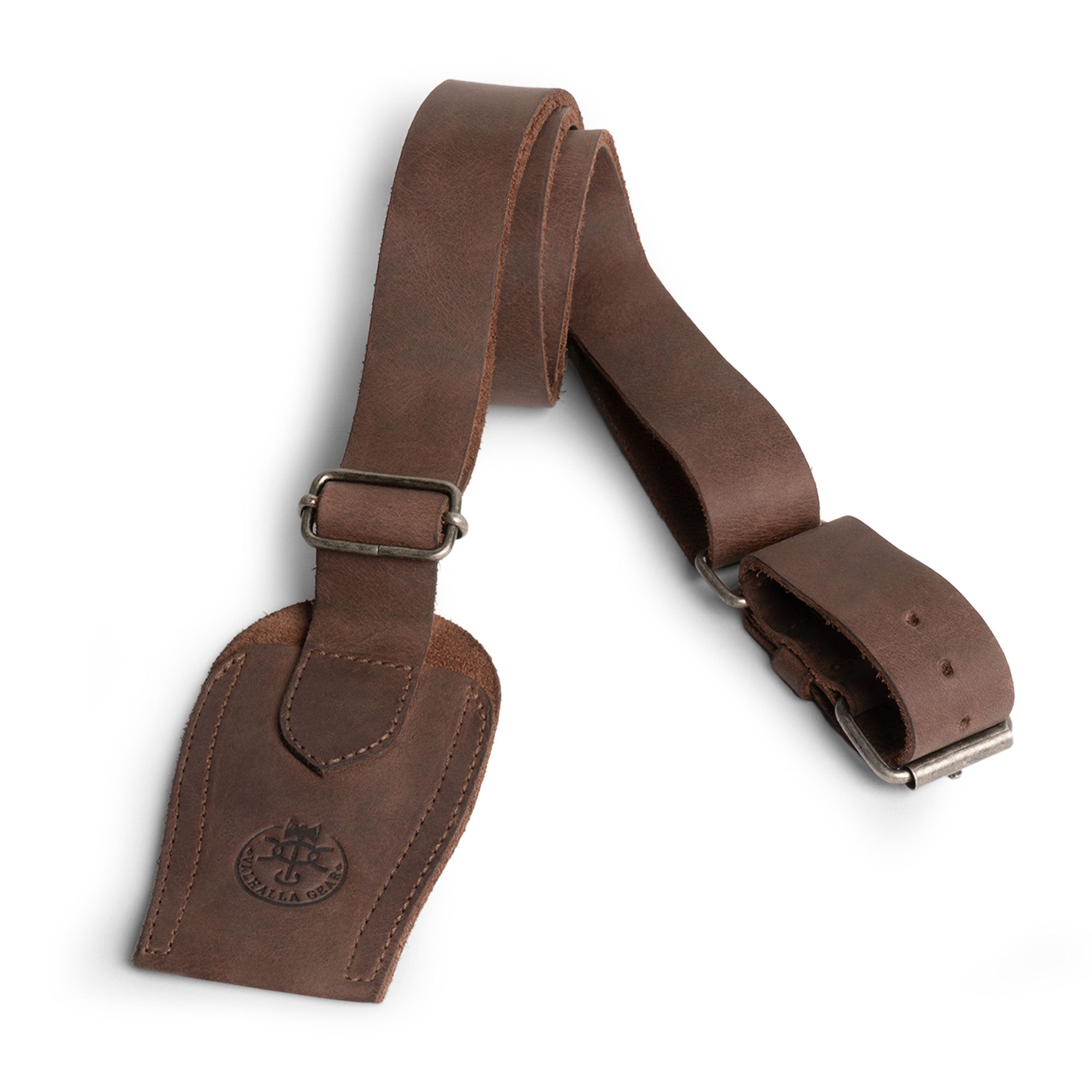 The adjustable Archery Bow Sling from Valhalla Gear displayed flat, highlighting its craftsmanship and high-quality materials for outdoor sports and activities. Ideal for bow hunting or shooting practice. Archery Bow Shoulder Strap, Sling, Bow Carrier, Hunting & Practice, Full Grain Leather, StockyardX, Small Batch Production, Hand Cut, Hand Sewn, Fire Branded, Artisan, Handmade in La Antigua Guatemala & Oaxaca Mexico.