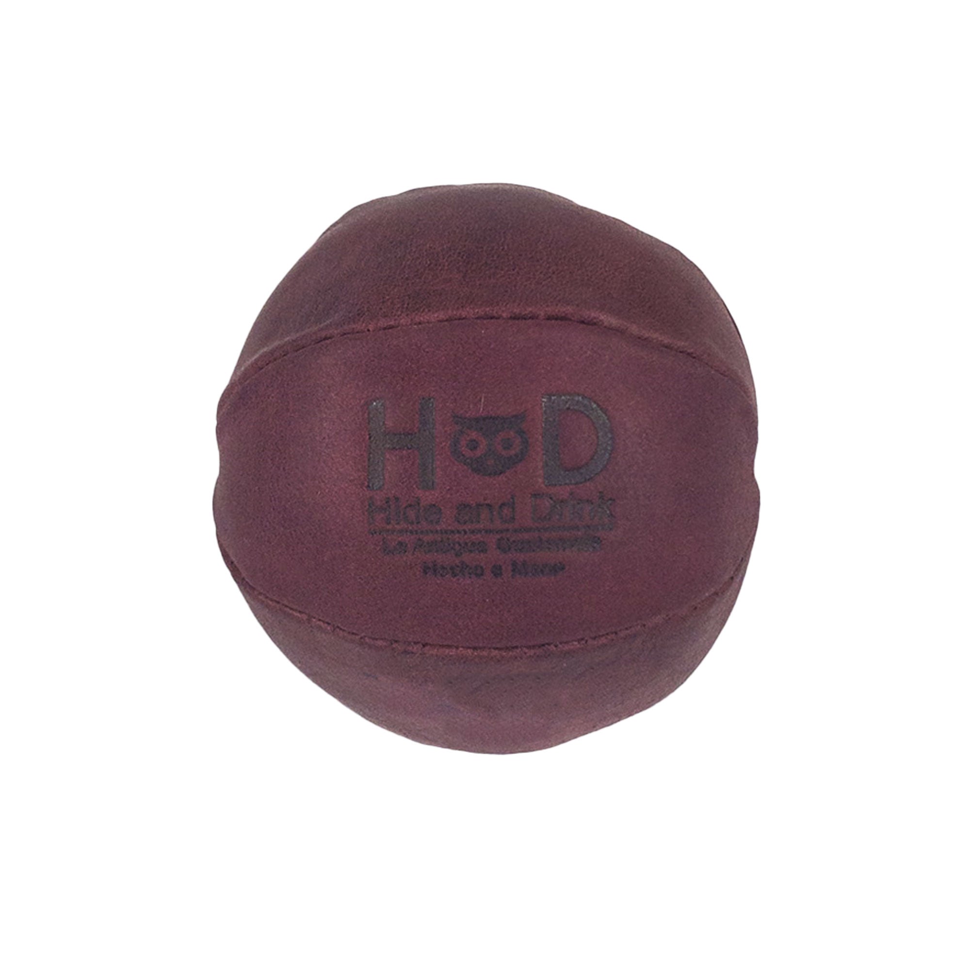Hide & Drink maroon Stress Ball showcasing its rich color, designed to help relieve fidgeting and anxiety. This squishy tension accessory combines classic style with full grain leather, handmade in La Antigua Guatemala.