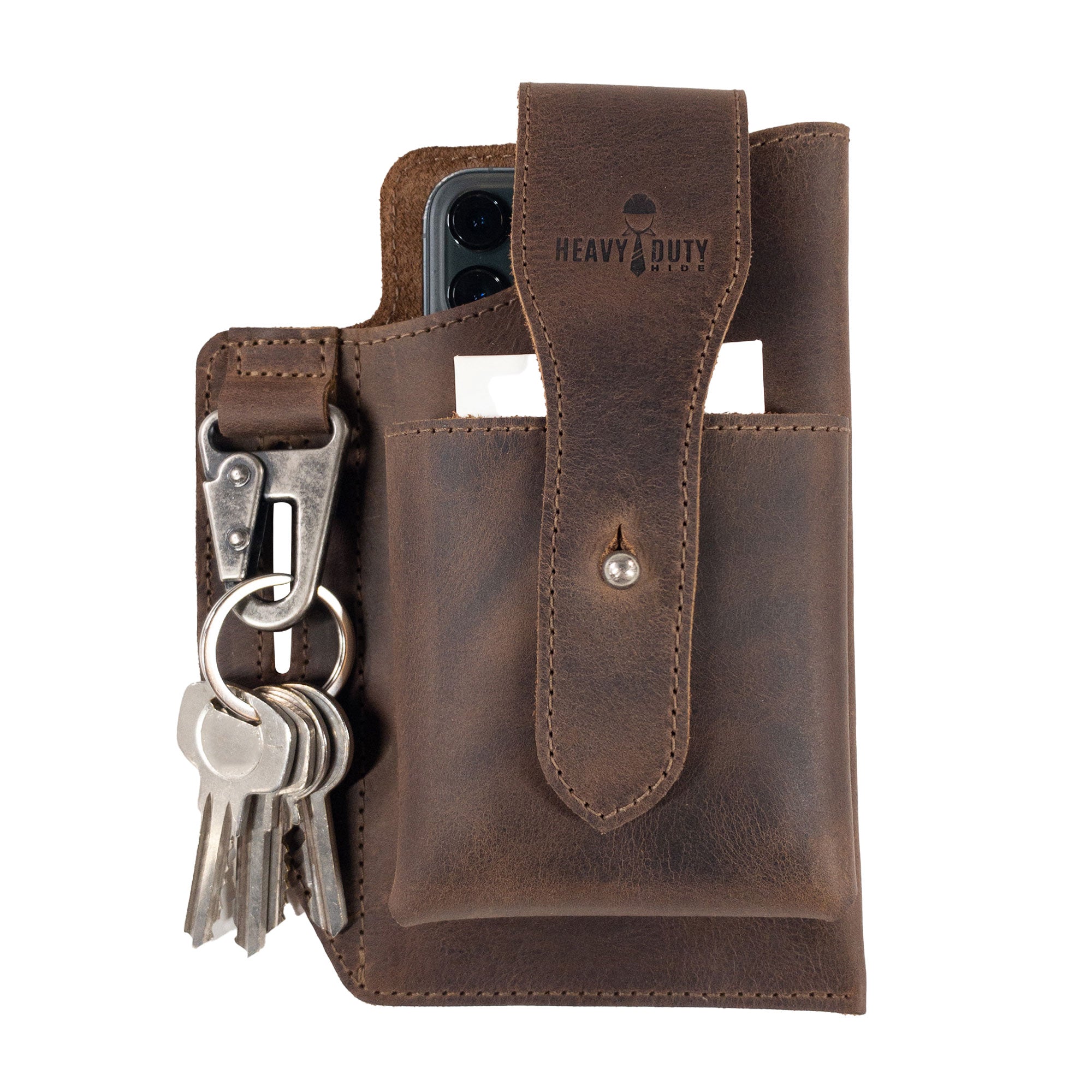 Heavy Duty Hide Rustic Phone & Cigarette Pack Holder, a stylish and practical accessory made from full grain leather. This tactical organizer is perfect for outdoor use, showcasing small batch production techniques with hand-cut and hand-sewn details. Artisan craftsmanship from La Antigua Guatemala & Oaxaca Mexico.
