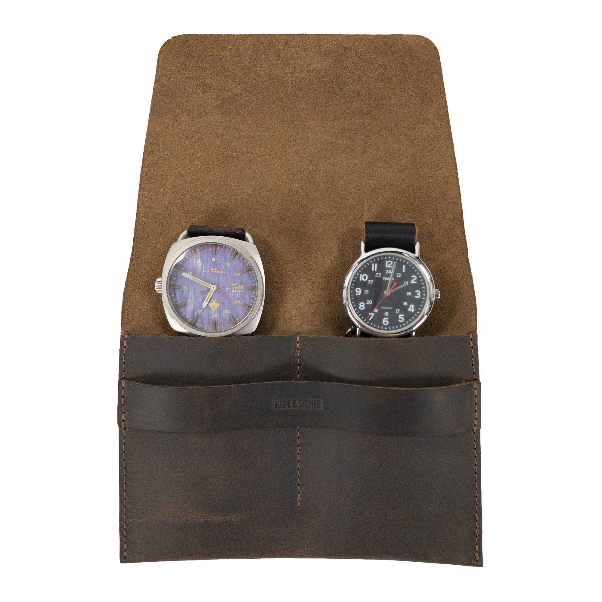 Showcasing the Hide & Drink Double Watch Case, this image features a vintage watch case with 2 slots, crafted from rustic full grain leather. Ideal for watch enthusiasts seeking a durable and stylish accessory, this handmade item embodies small batch production and artisan quality, made in La Antigua Guatemala and Oaxaca Mexico.