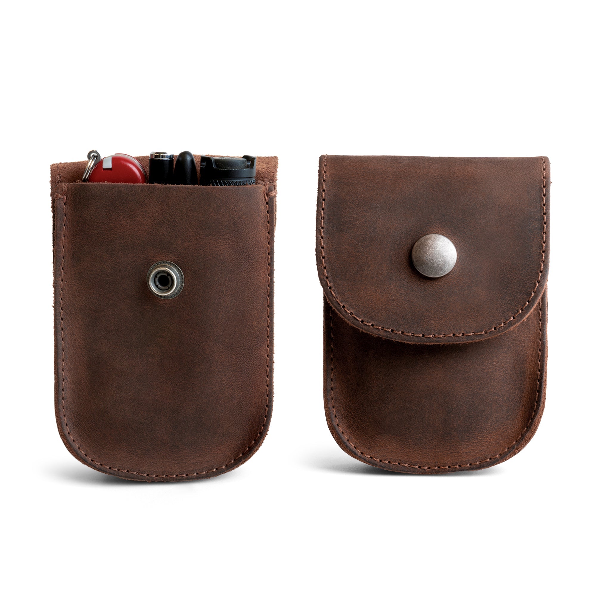 Handmade Holster Pouch by Hide & Drink, made from full grain leather, designed as a durable EDC waist bag for coins, pocket wallet, and personal items. Conveniently attaches to belt, showcasing small batch production and artisan craftsmanship from La Antigua Guatemala.