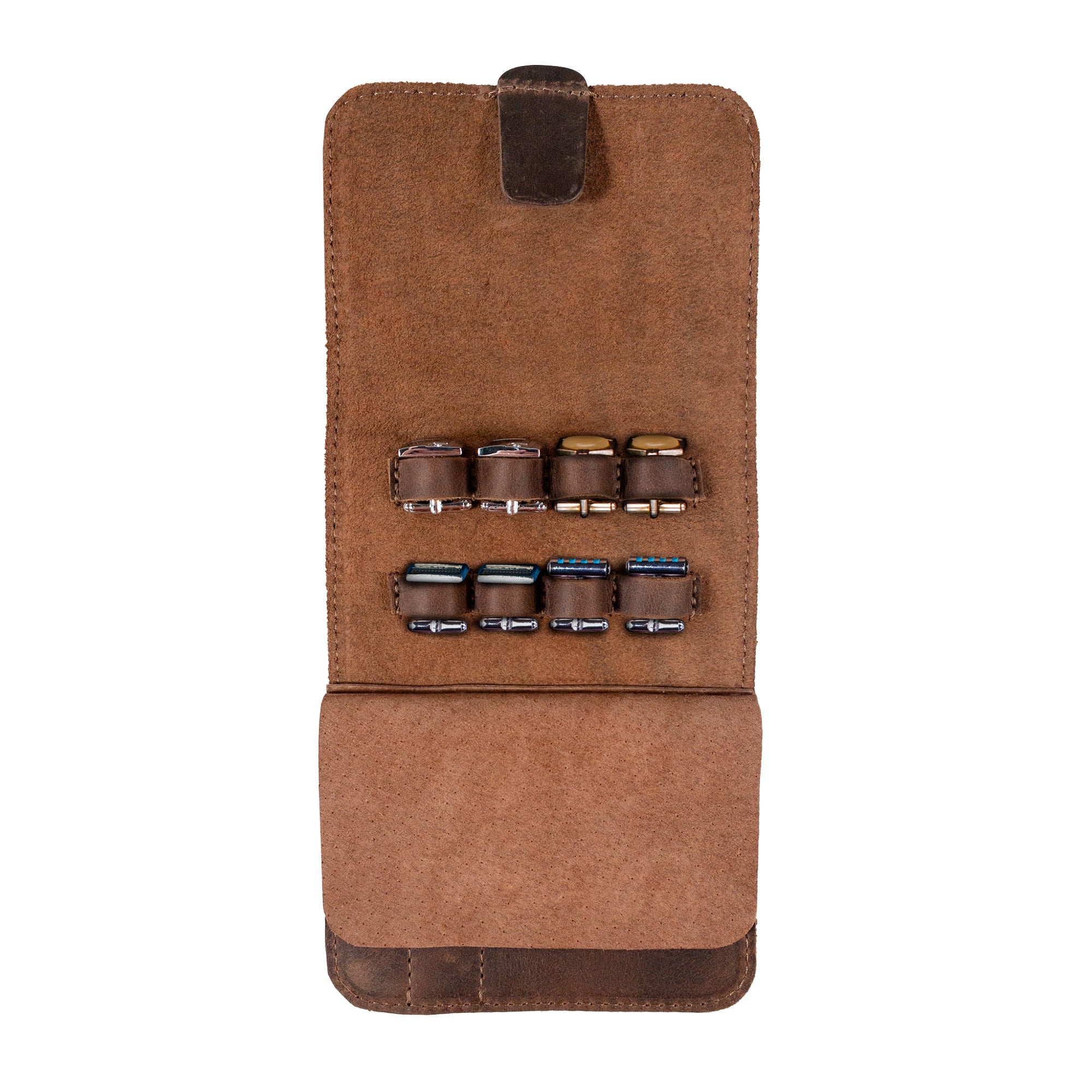 Interior view of a Rustic Case for Groomsmen Accessories by Hide & Groom featuring compartments for organizing cufflinks and collar stays. This rectangular travel bag is made from full grain leather, ideal for groomsmen, best men, and bachelors. Handcrafted with small batch production methods in La Antigua Guatemala.