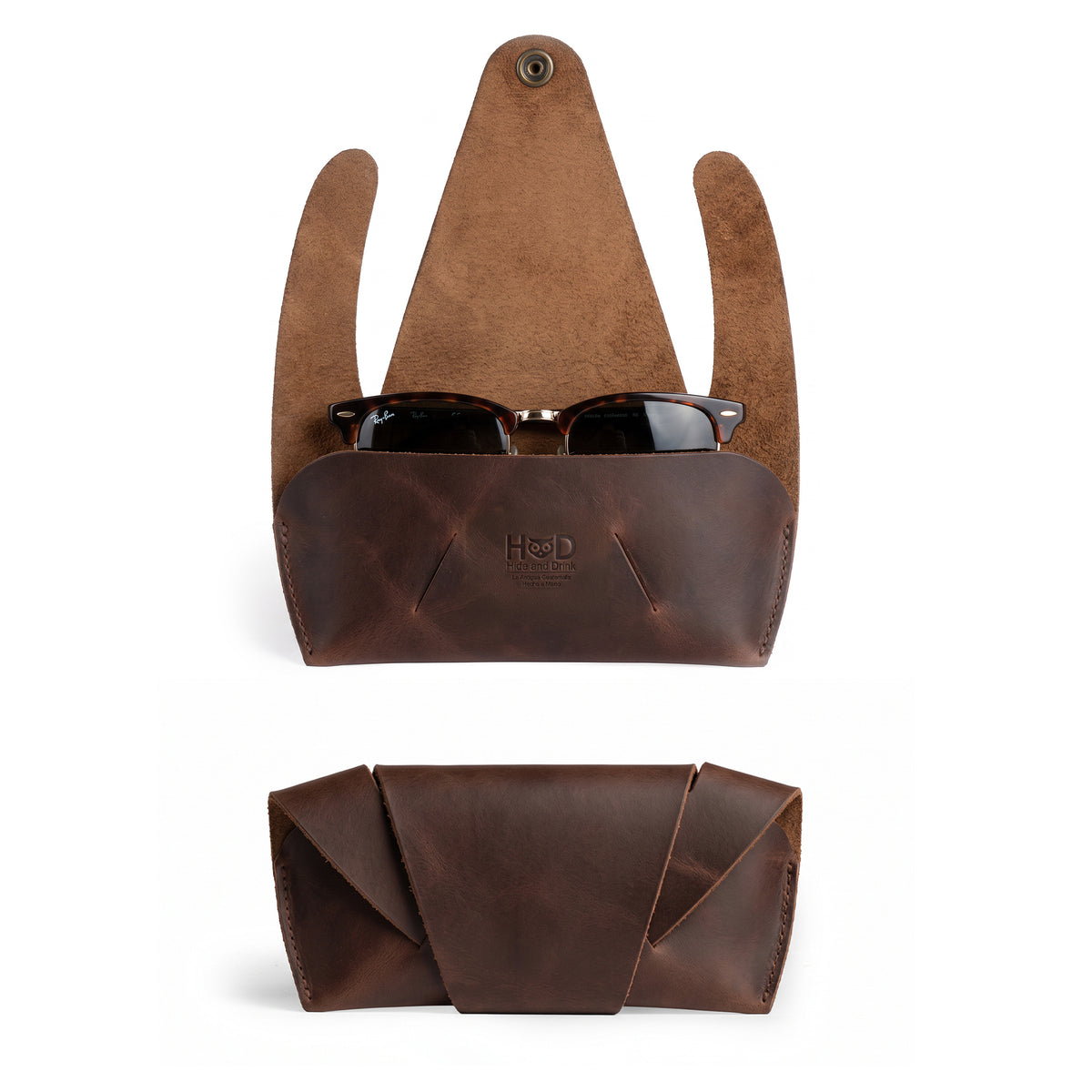 Front view of the Foldable Sunglass Case by Hide & Drink, made from Full Grain Leather, showcasing artisan craftsmanship through small batch production, hand cut and sewn, and fire branded for authenticity. Perfect for stylish protection of your sunglasses.