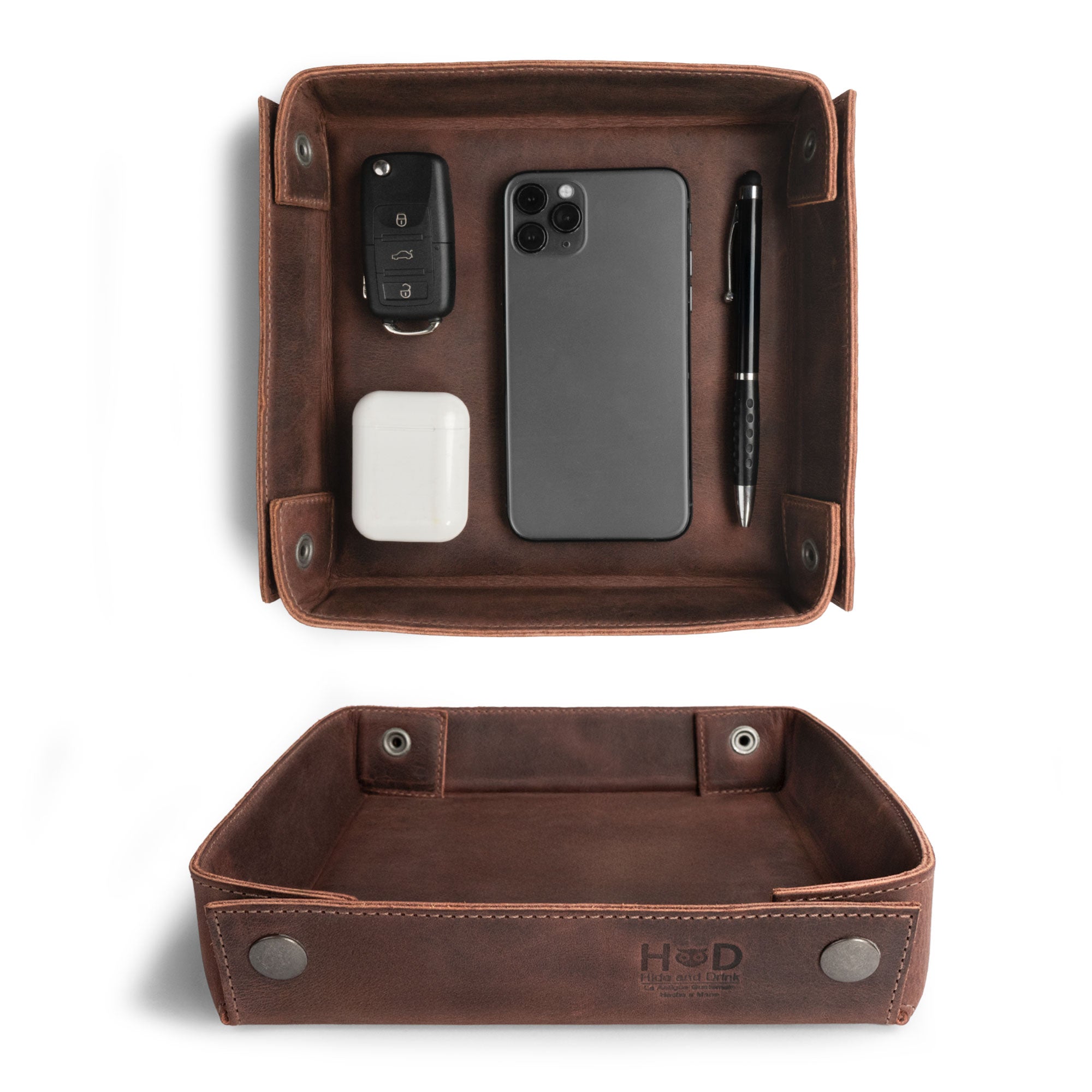 Hide & Drink Jumbo Tray made from durable full grain leather, designed as a catchall tray for easy access organization of keys, coins, and smartphones. This vintage style tray showcases small batch production and artisan craftsmanship, handmade in La Antigua Guatemala.