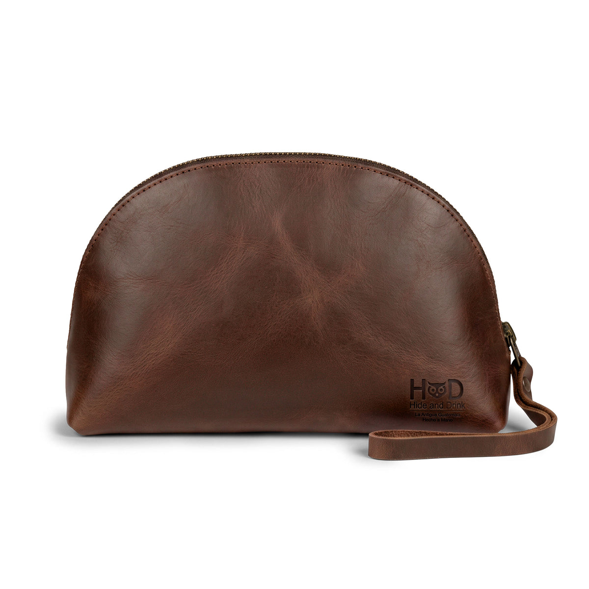 A stylish Accessory Pouch Organizer Hand Bag by Hide & Drink, made from rich full grain leather. This Cosmetic Travel Organizer with Hand Strap for Women is perfect as a Makeup Bag or Classic Handbag. It's hand cut, hand sewn, and artisan crafted in La Antigua Guatemala & Oaxaca Mexico, ensuring durability and timeless appeal.