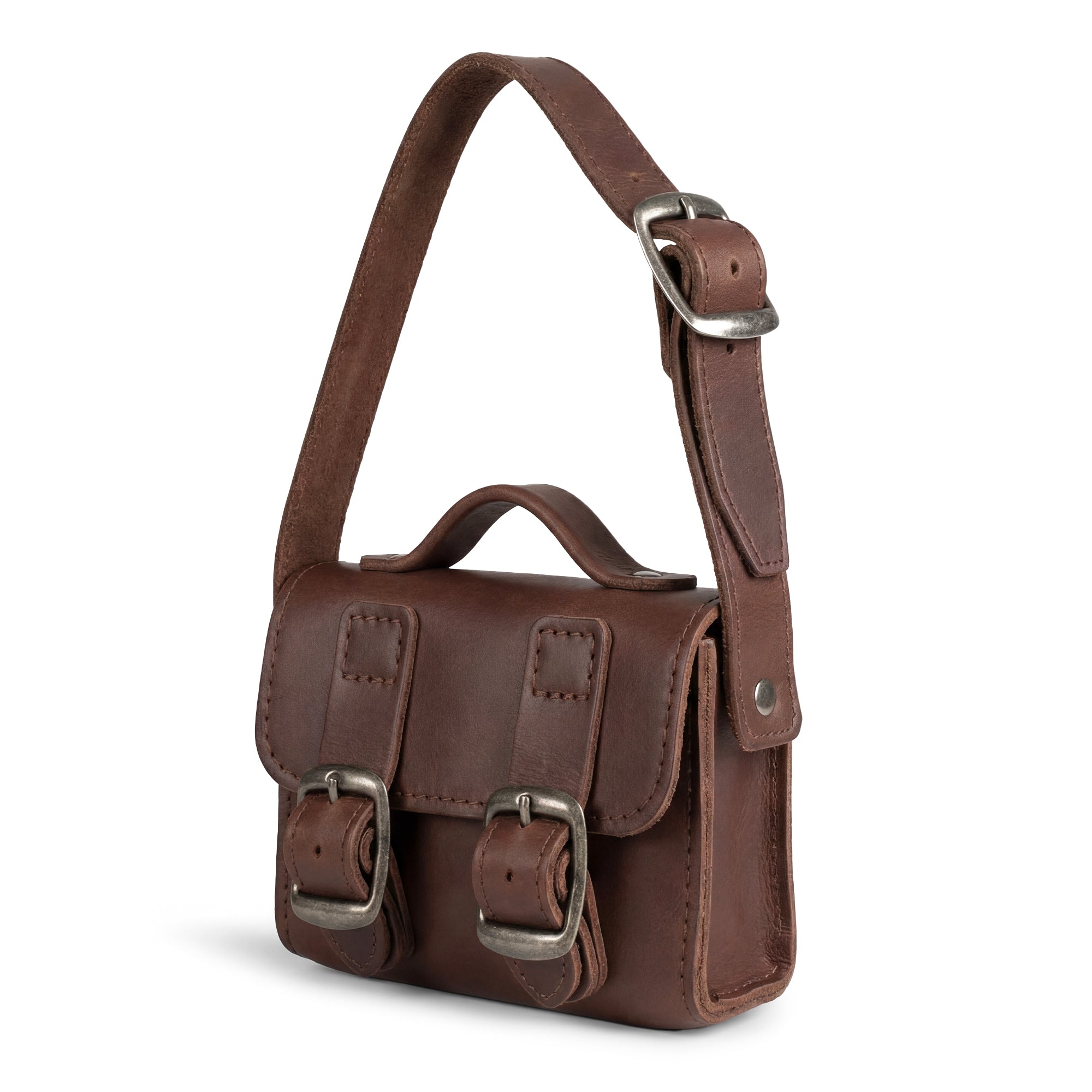 Tiny Messenger Bag by Hide & Drink, a charming Mini Messenger Bag Charm made from premium Full Grain Leather. This artisan accessory is perfect as a keychain or for handbags. Handmade in La Antigua Guatemala, featuring small batch production, hand cut, hand sewn, and fire branded details.