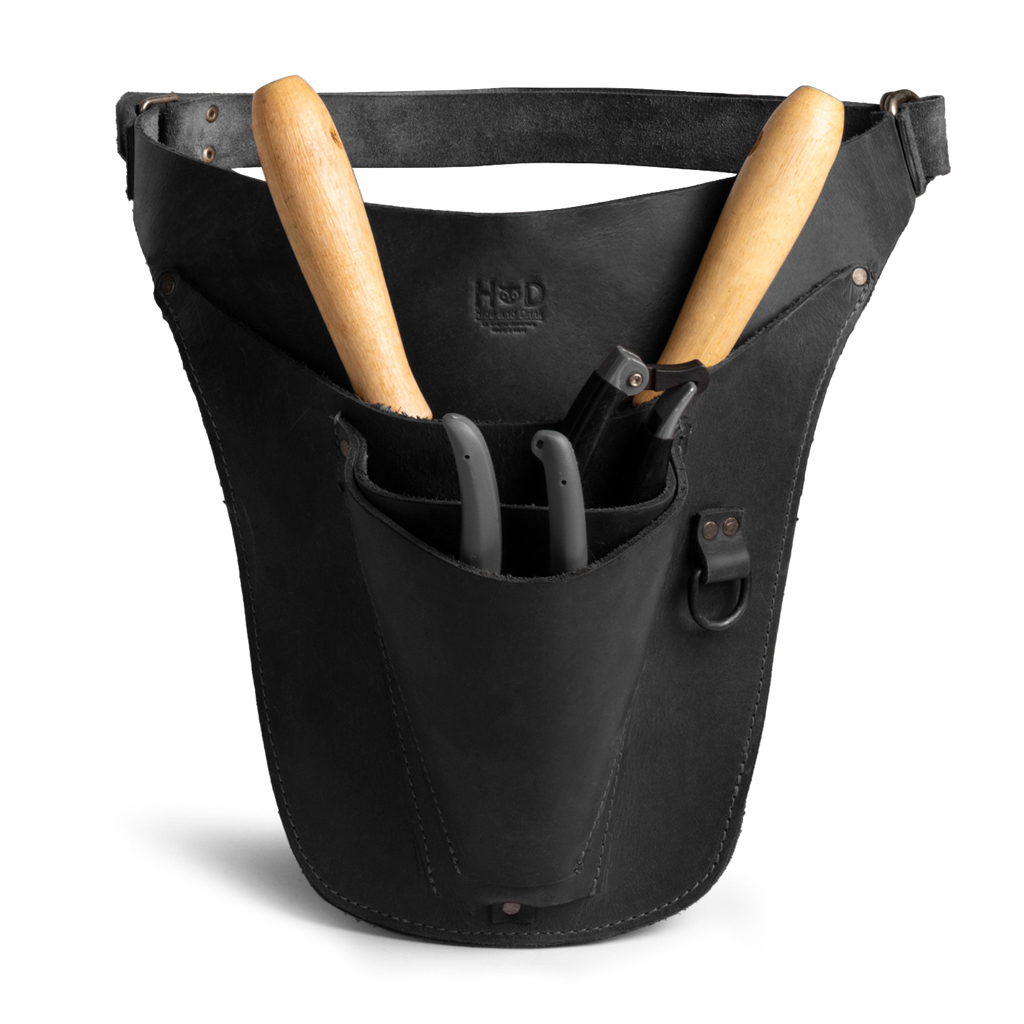 Hide & Drink Florist Tool Belt in black leather, exemplifying elegance and utility. This Florist Tool Belt for Men & Women allows for adjustable wear, making it a great choice for gardening and construction. Artisan crafted in La Antigua Guatemala & Oaxaca Mexico, emphasizing the quality of small batch production.