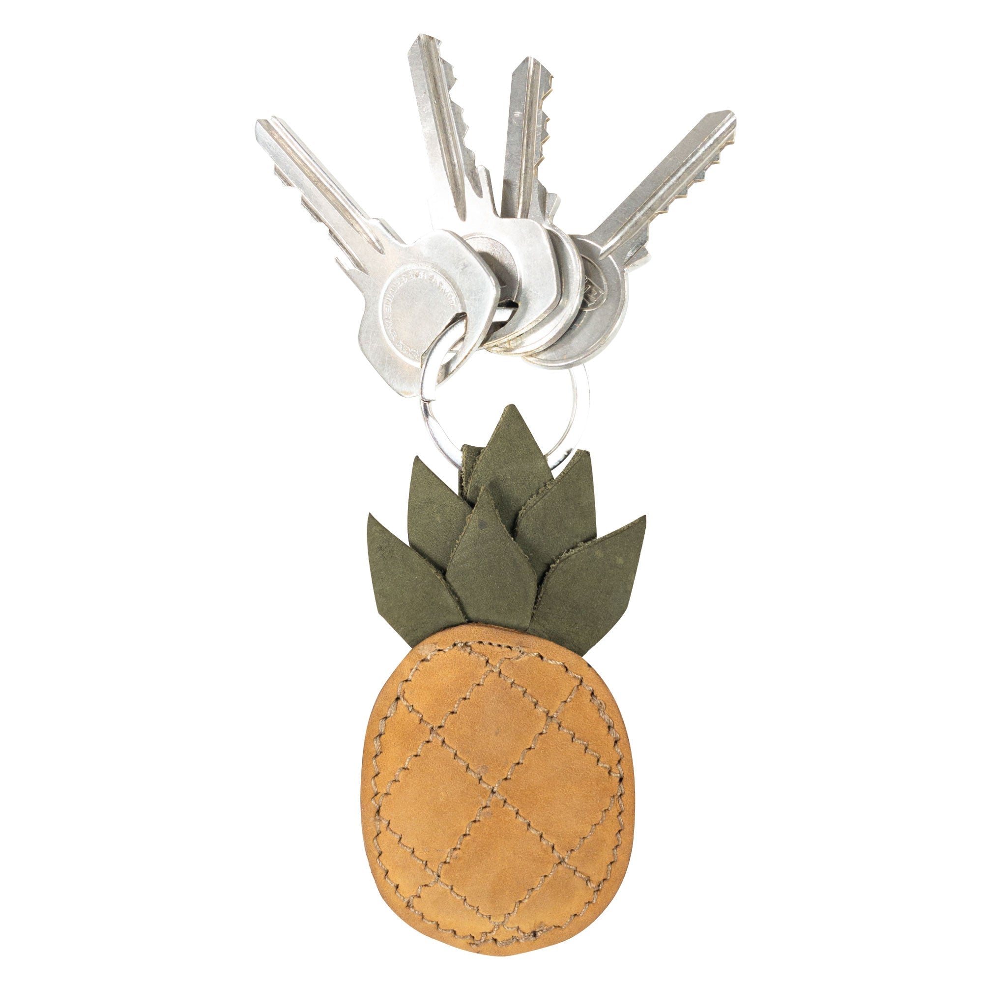 A stylish Pineapple Keychain by Hide & Drink, featuring a charming tropical fruit design with green leaves, perfect for adding a touch of fun to your keys. This keyring is handcrafted from high-quality full grain leather in small batch production, showcasing artisanal craftsmanship. Ideal for anyone who loves unique accessories.